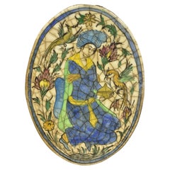 Antique figurine ovale en céramique persane Iznik de style Qajar avec oiseau C3