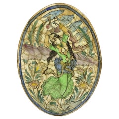 Ancienne poterie persane Iznik Qajar de style céramique, carreaux ovales verts représentant une danseuse, C3