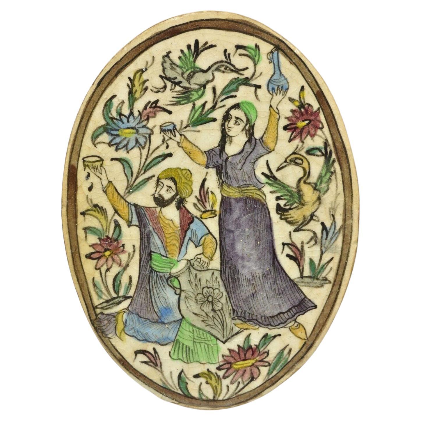 Anciennes pichets en céramique persane Iznik de style Qajar à carreaux ovales Man et femme C3