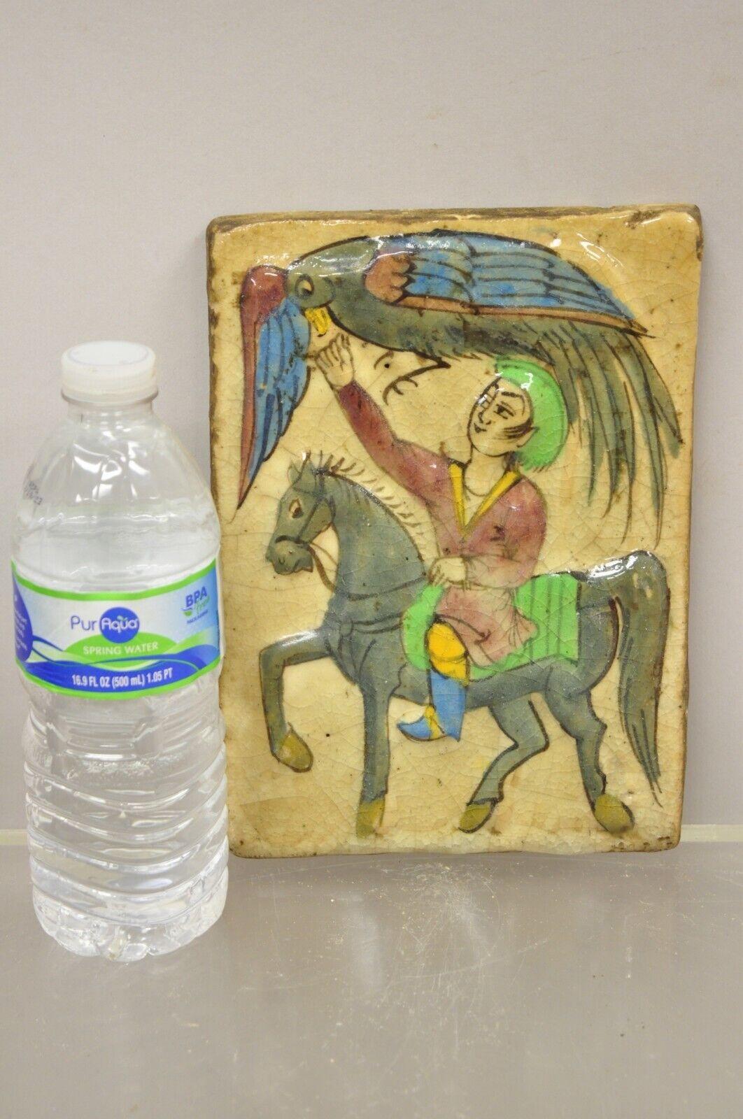 Antique Persian Iznik Qajar style ceramic pottery tile blue phoenix bird and horse rider C4 D. Item features Original crackle glazed finish, heavy ceramic pottery construction, very impressive detail, wonderful style and form. Great to mount as wall