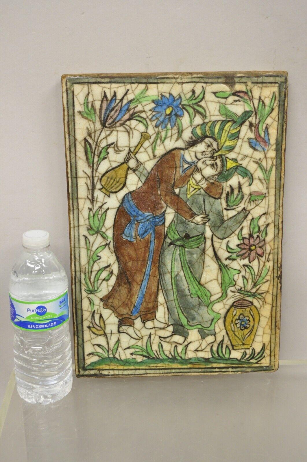 Antique Persian Iznik Qajar style large ceramic pottery tile green couple embrace C1. Original crackle glazed finish, heavy ceramic pottery construction, very impressive detail, wonderful style and form. Great to mount as wall art or accent tiles