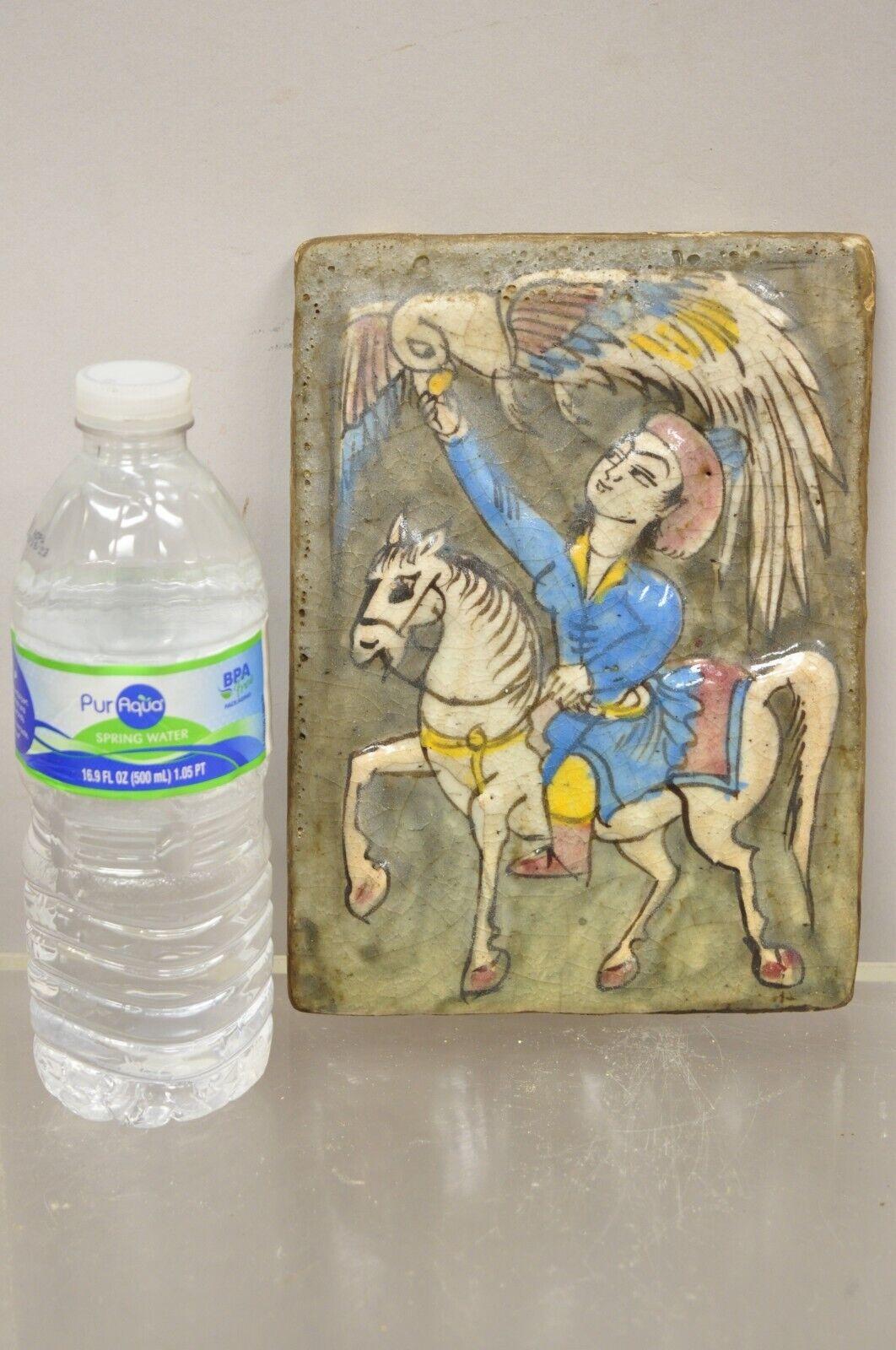 Antique Persian Iznik Qajar Style Ceramic Pottery Tile Horse Rider and Bird C4. Item features original crackle glazed finish, heavy ceramic pottery construction, very impressive detail, wonderful style and form. Great to mount as wall art or accent