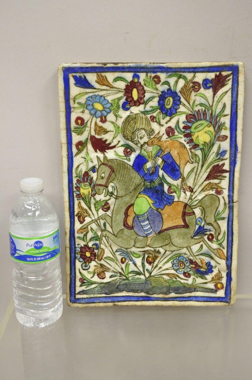 Antique Persian Iznik Qajar Style Ceramic Pottery Tile Horse Rider Hunt Scene (B) - C1. Item features an original crackle glazed finish, heavy ceramic pottery construction, very impressive detail, wonderful style and form. Great to mount as wall art