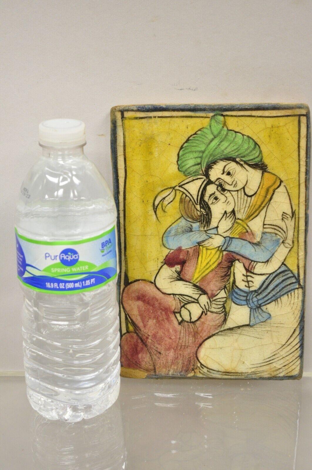 Antique Persian Iznik Qajar Style ceramic yellow pottery tile Loving Couple B C5. Item features original crackle glazed finish, heavy ceramic pottery construction, very impressive detail, wonderful style and form. Great to mount as wall art or
