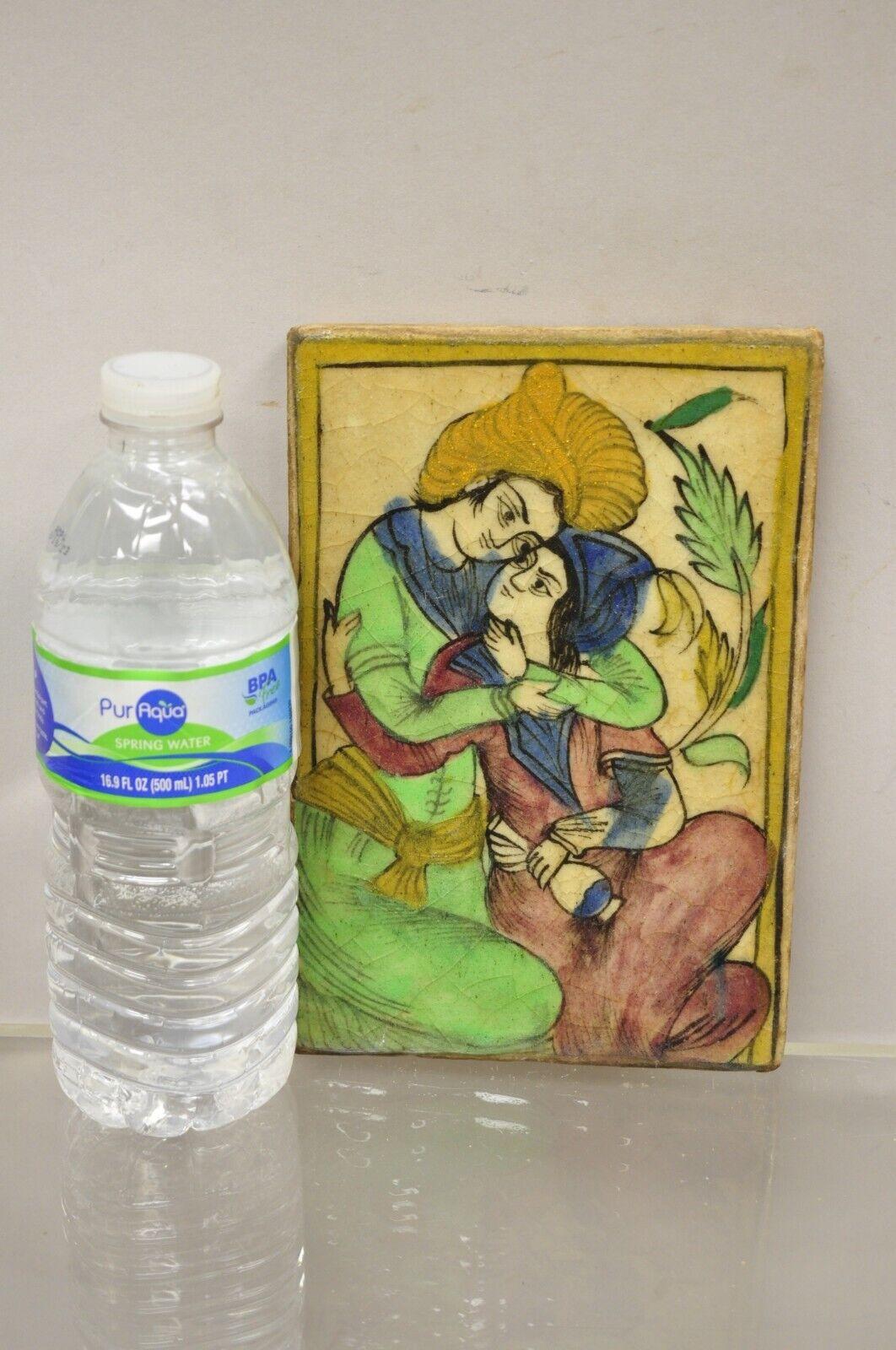 Antique Persian Iznik Qajar style green ceramic pottery tile loving couple C5. Item features original crackle glazed finish, heavy ceramic pottery construction, very impressive detail, wonderful style and form. Great to mount as wall art or accent