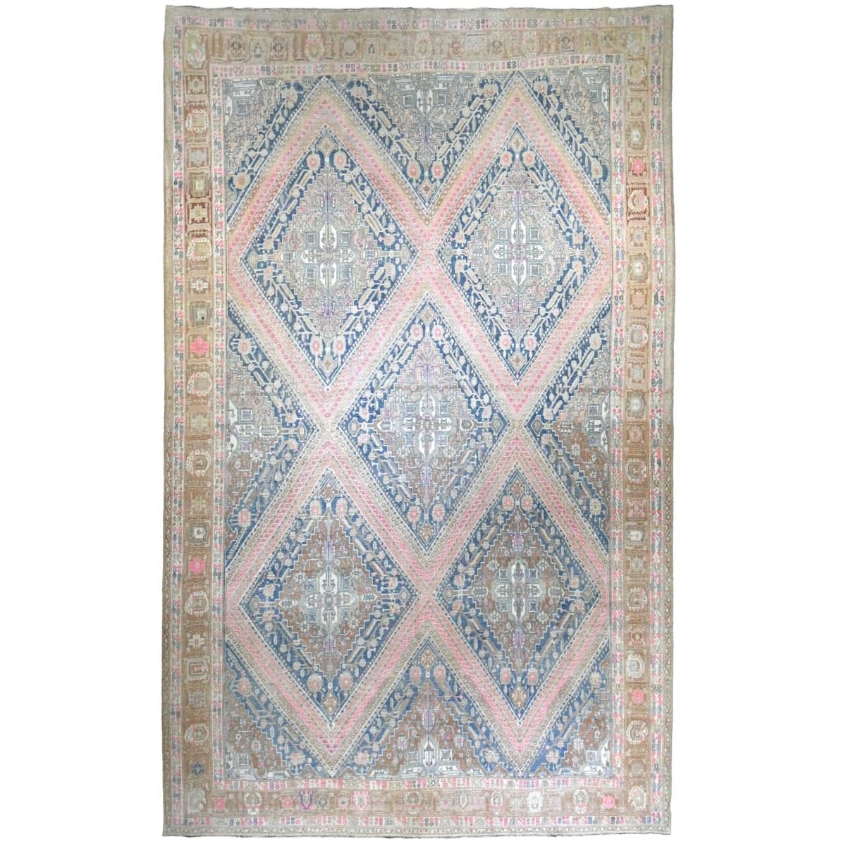 Circa: 1920’s

Dimensions: 11’x 17’

Material: 100% Wool Pile, Hand Knotted

Design: Persian, Joshagan Design

17836

Persian rugs and carpets of various types were woven in parallel by nomadic tribes in village and town workshops, and by royal