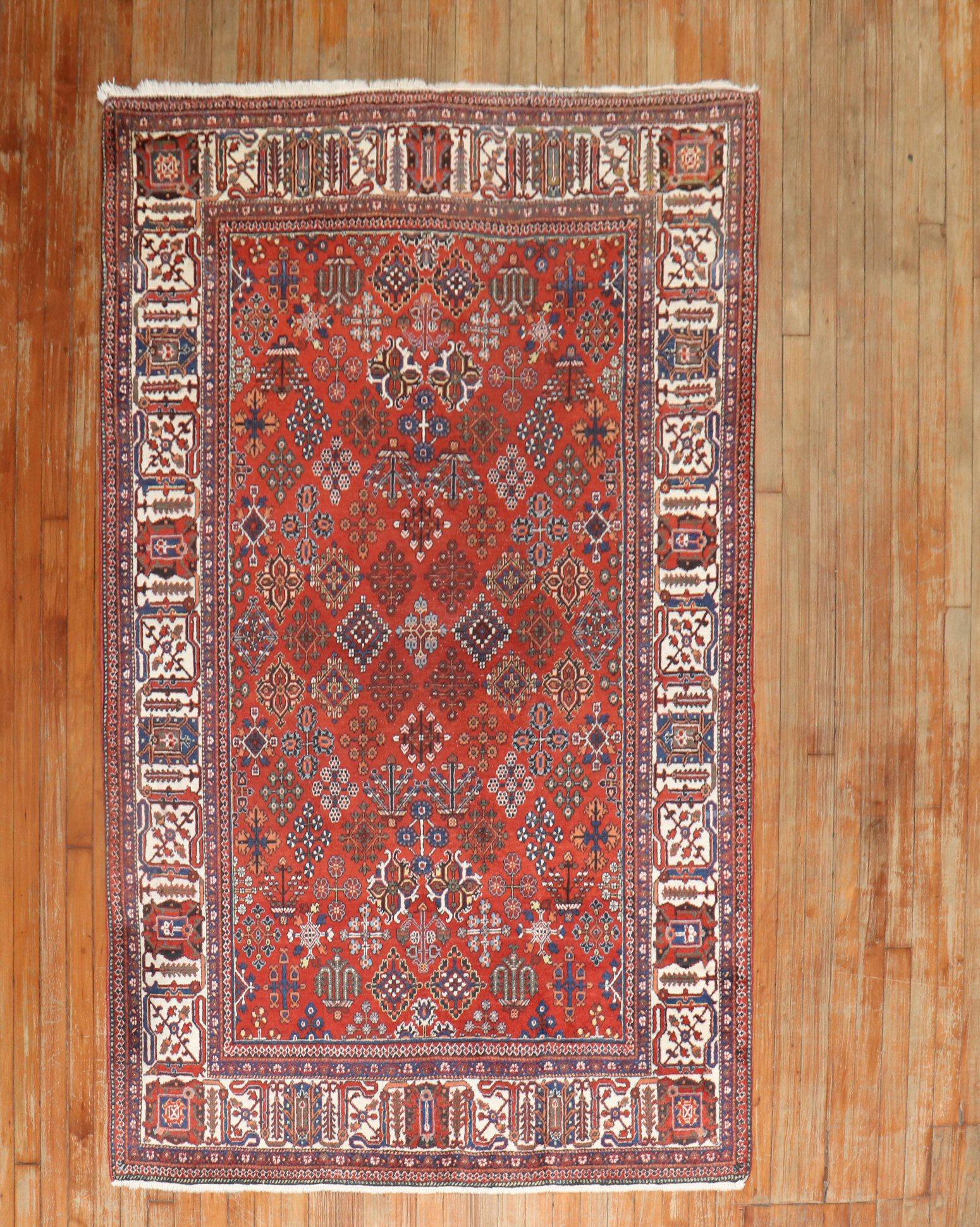 An early 20th century Persian Joshegan carpet.

Measures: 4'6'' x 7'2''

The town of Josheghan is located 140 kilometers north of Isfahan. This small city is important in the history of carpet weaving in Iran and has gained fame for its old