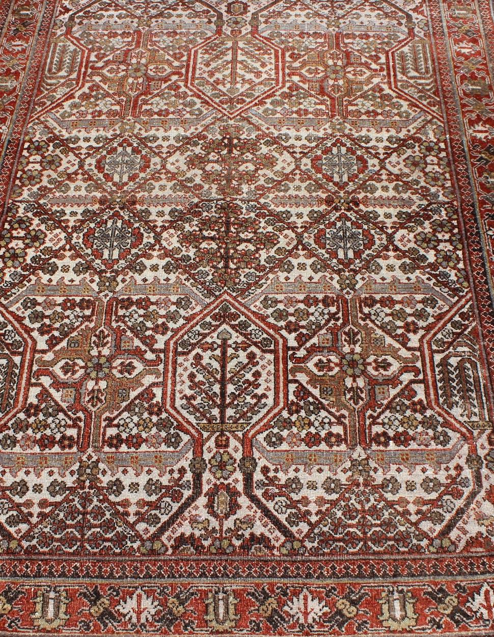 Early 20th Century Antique Persian Joshegan Rug in Ivory Background with Red, Green and Blue  For Sale