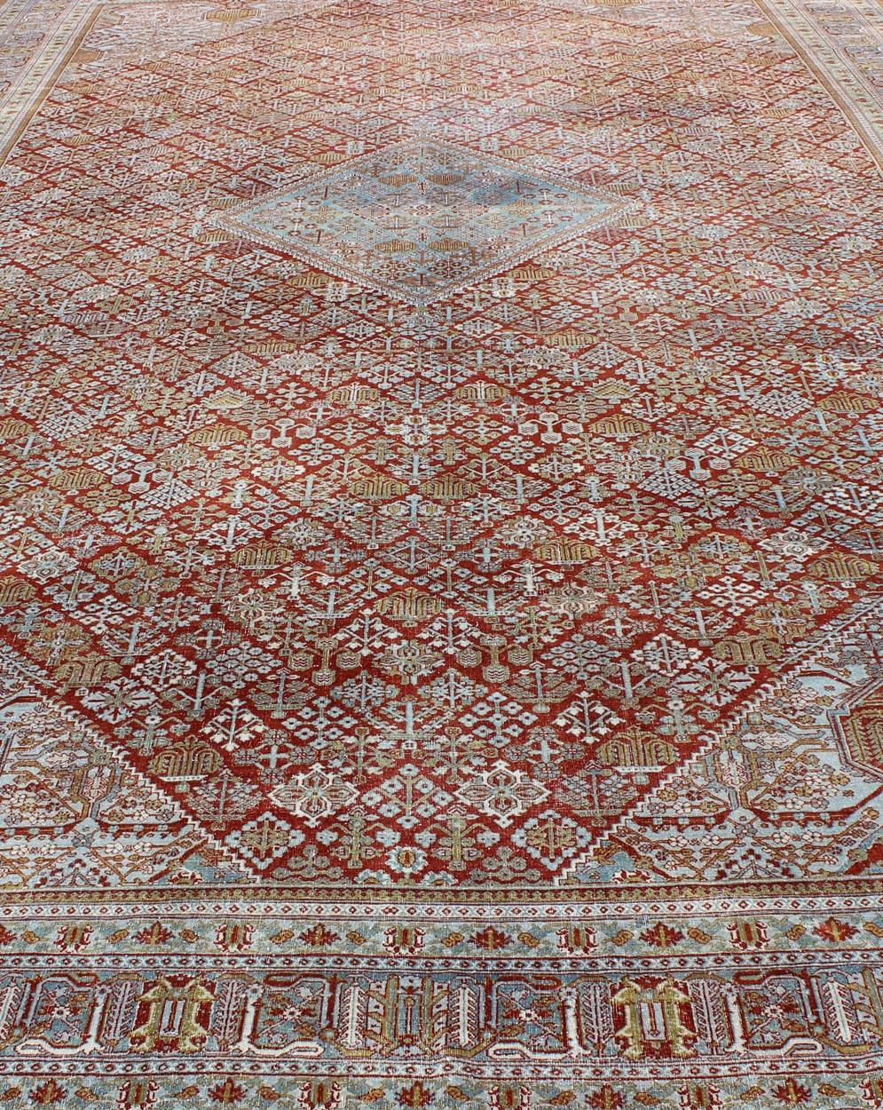 Large Antique Persian Joshegan Rug in Rust Red, Light Blue, Green, Gold & Olive In Good Condition For Sale In Atlanta, GA