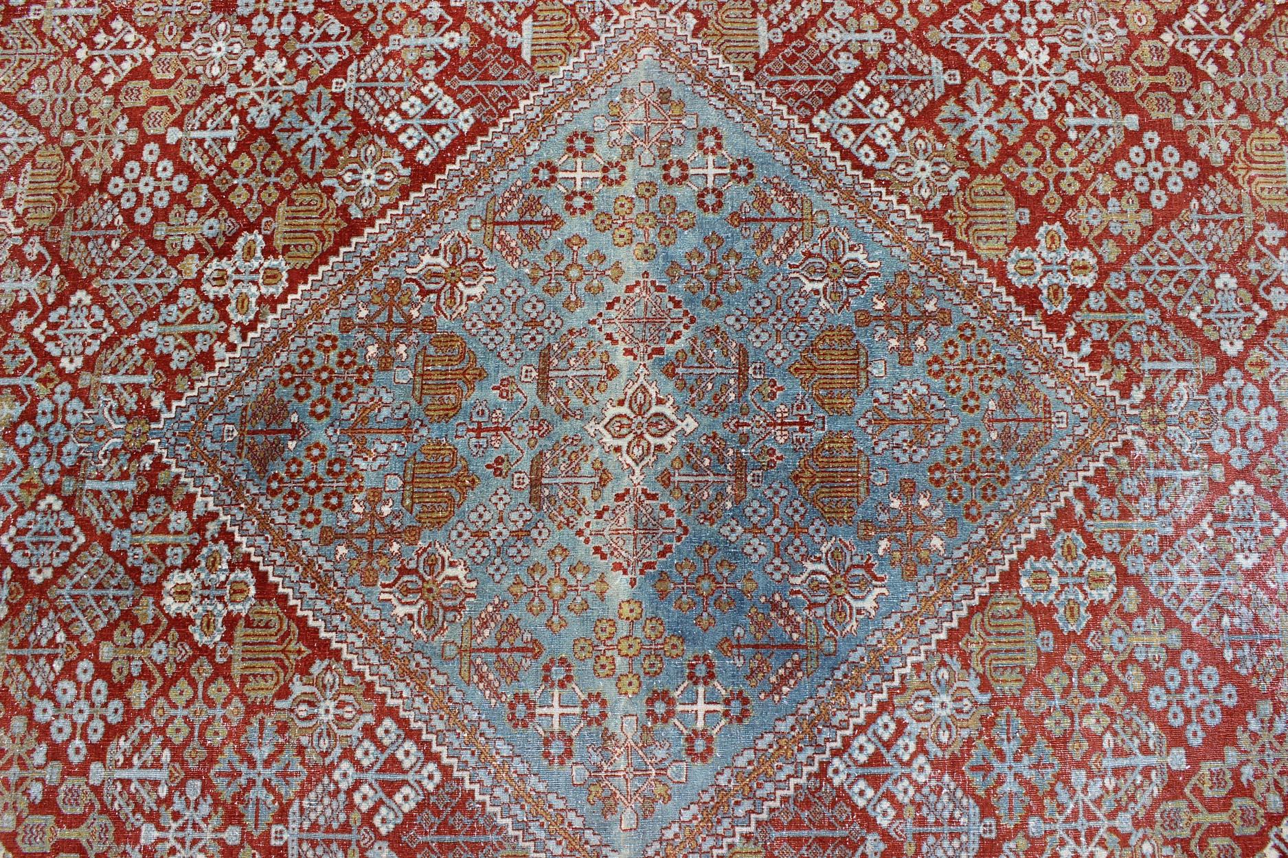 Wool Large Antique Persian Joshegan Rug in Rust Red, Light Blue, Green, Gold & Olive For Sale