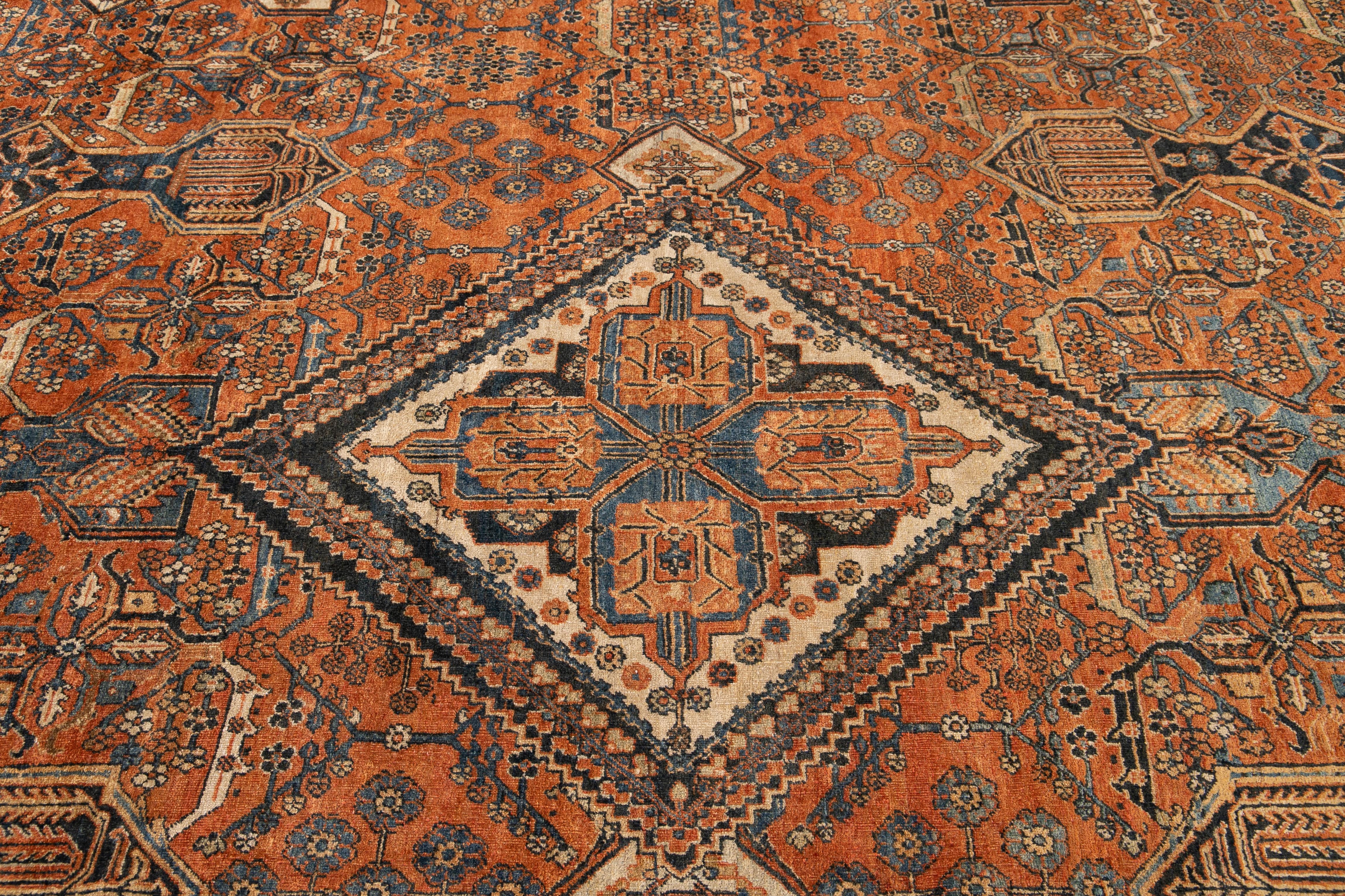 20th Century Antique Persian Josheghan Orange Handmade Oversize Wool Rug with Medallion Motif For Sale