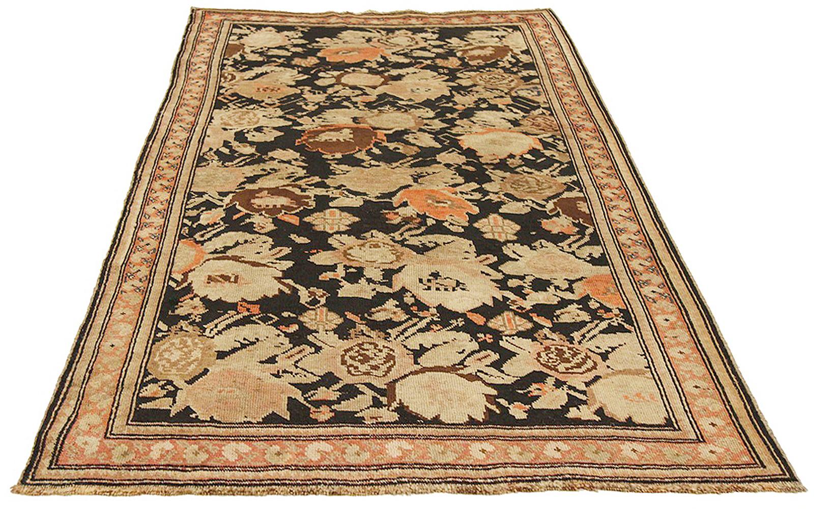 Antique Persian rug handwoven from the finest sheep’s wool and colored with all-natural vegetable dyes that are safe for humans and pets. It’s a traditional Karabagh design featuring a colorful cow figure over a red and pink field. It’s an elegant