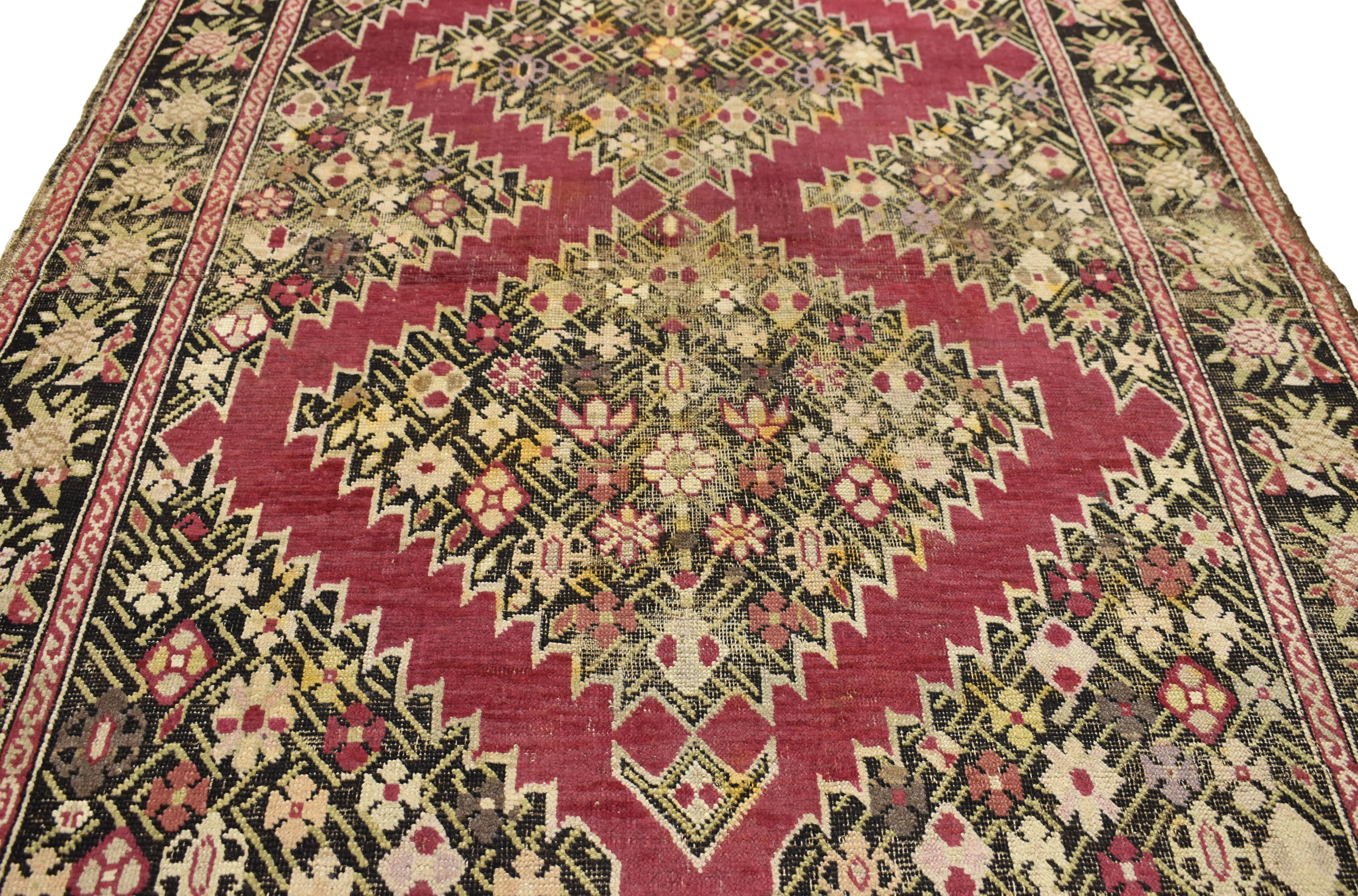 74295, antique Persian Karabakh rug, Persian Gharabagh accent rug with old world style. This hand-knotted wool antique Persian Karabakh rug features double lozenge medallions filled with stylized flowers and rectilinear vines. The lozenge medallions