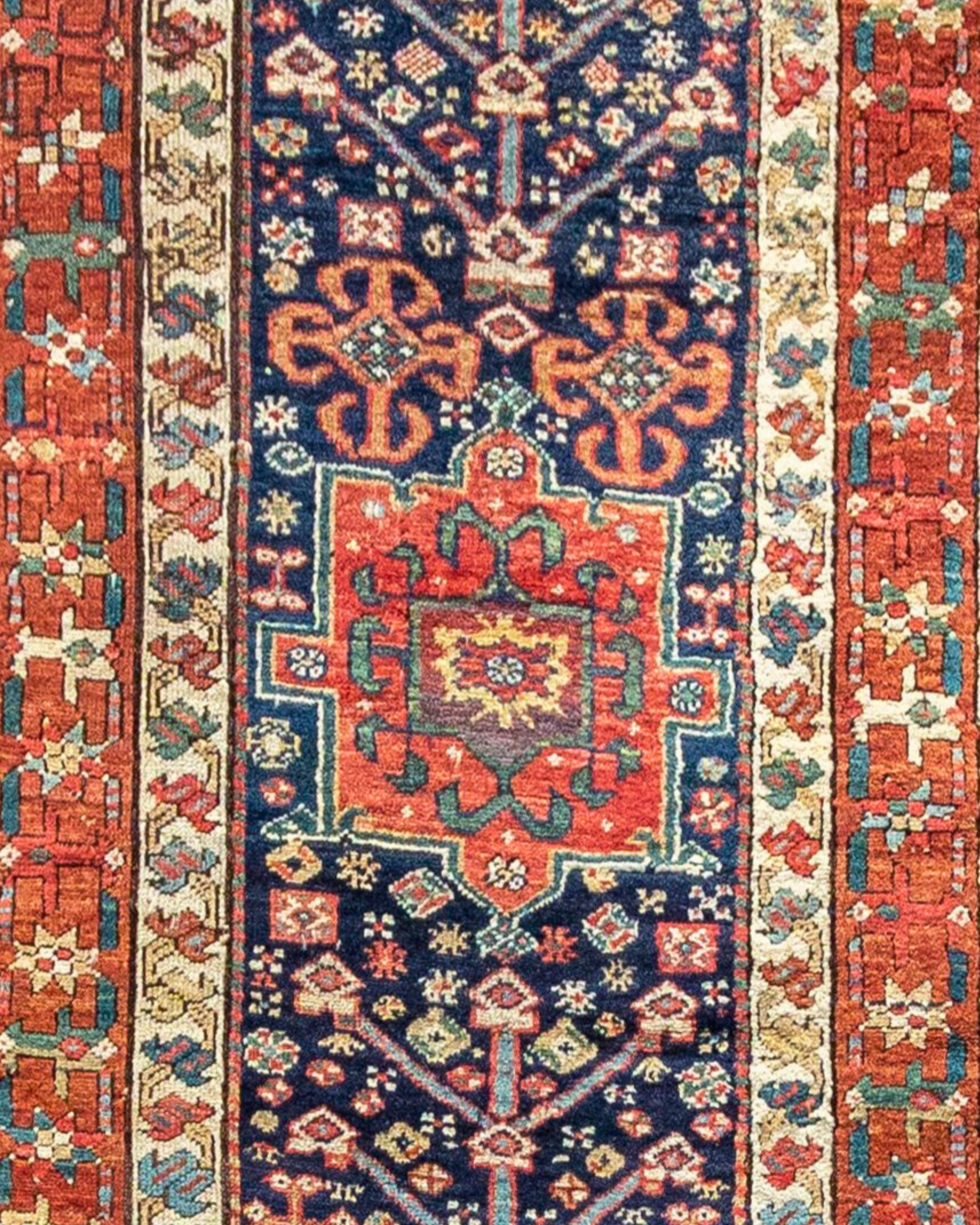 Antique Persian Karadagh Runner Runner Rug, 19th Century

Good condition with some small areas requiring re-knotting. Sold as is, repair quote on request.

Additional Information:
Dimensions: 3'3
