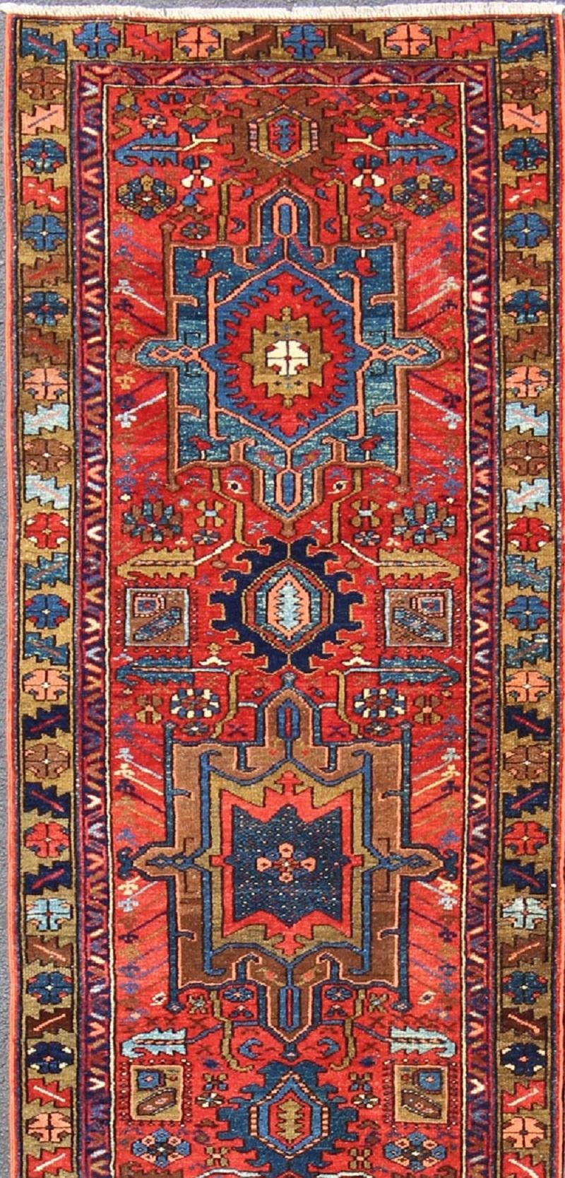Tribal Antique Persian Karadjeh Runner with Layered Geometric Medallions in Red-Orange For Sale