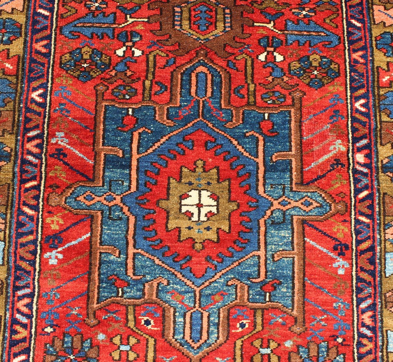 Early 20th Century Antique Persian Karadjeh Runner with Layered Geometric Medallions in Red-Orange For Sale