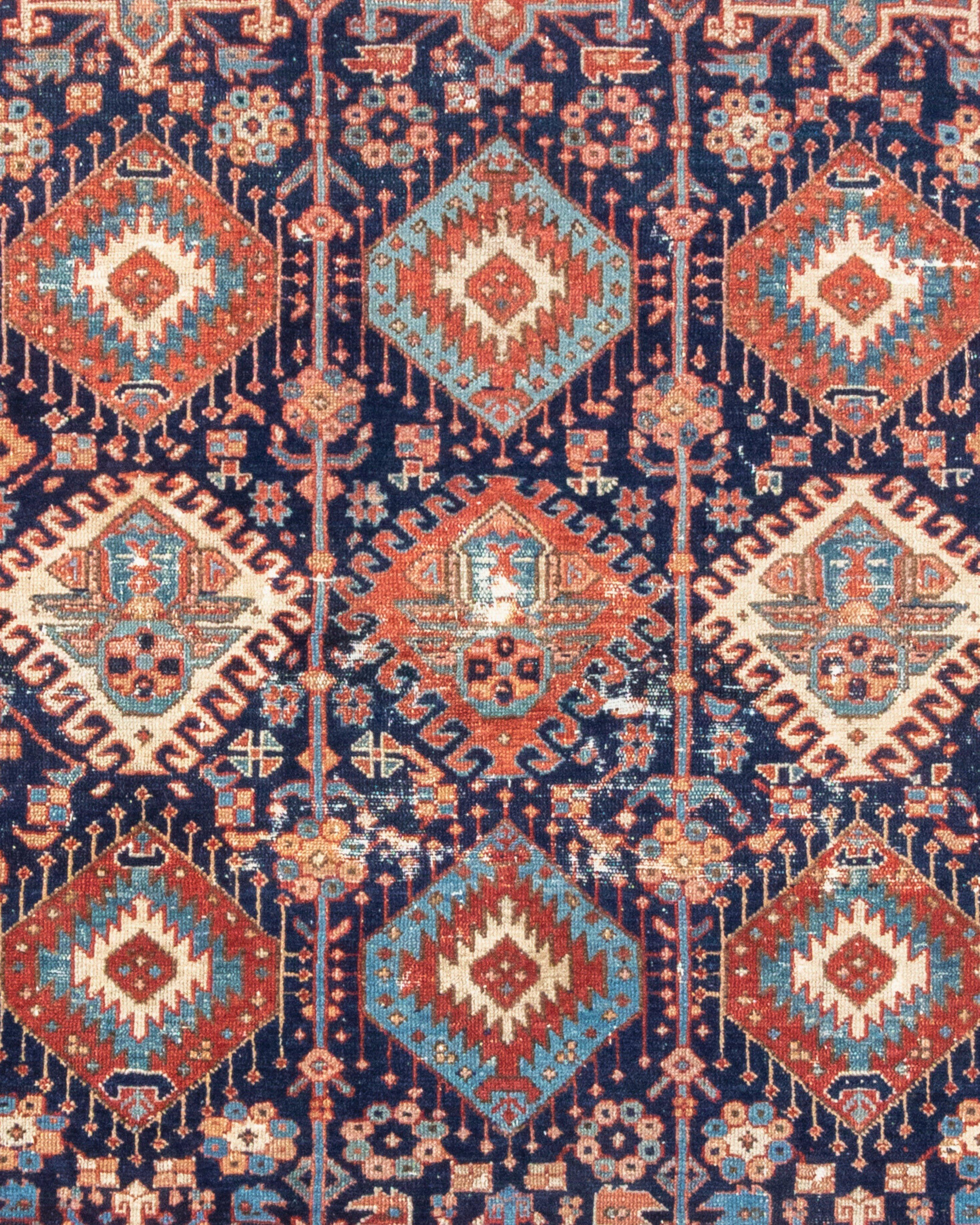 Antique Persian Karaja Rug, c. 1900

Being sold on behalf of Mr. and Mrs. Lenore Zaiser. Price includes restoration with the exception of reweaving the loss at the ends. Just a good securing of the ends.

Additional Information:
Dimensions: 5'10