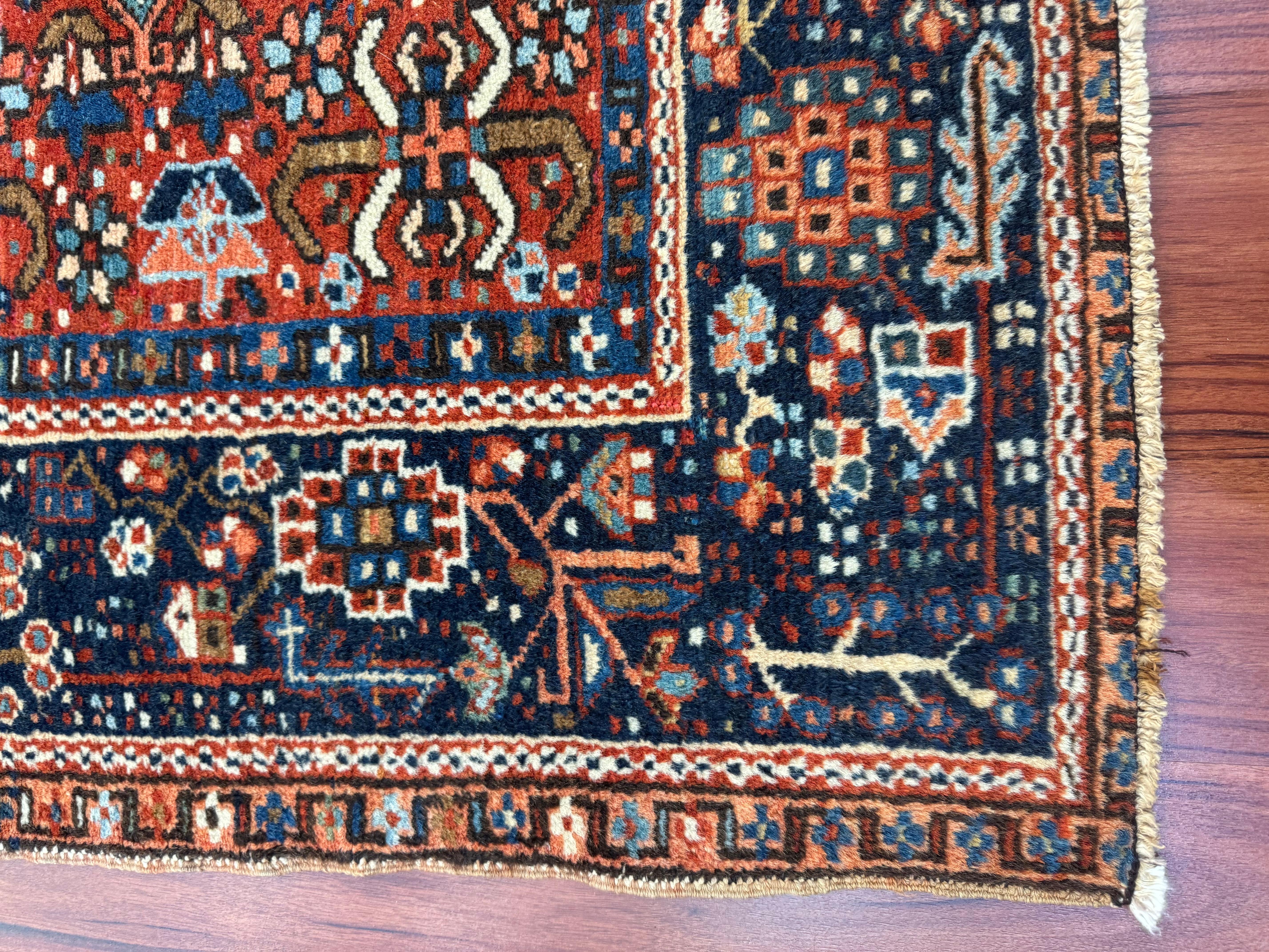 A stunning Antique Persian Karaja Rug that originates from Iran in the 1930s! This rug is in near excellent condition considering its rich history and has a beautiful combination of colors to match its design!