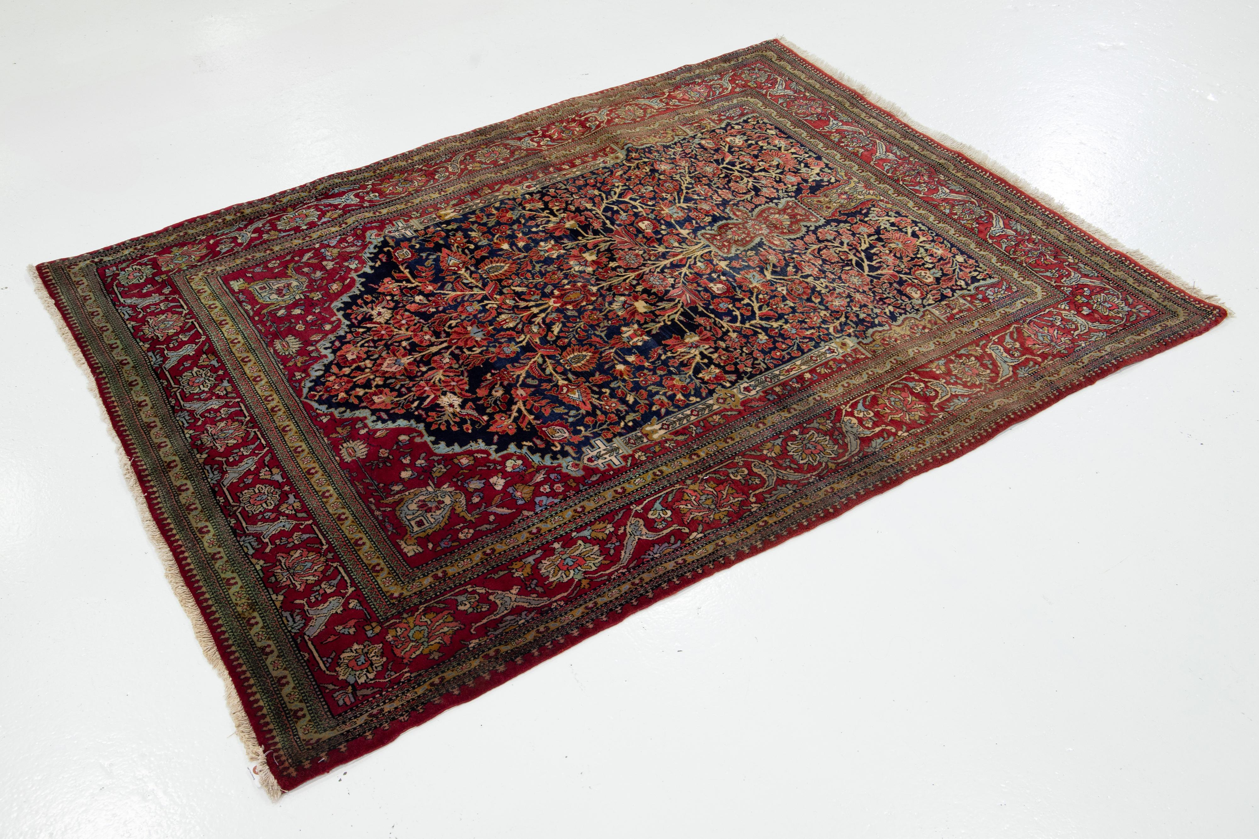 Noué à la main Tapis persan Kashan ancien entièrement conçu à la main en bleu et rouge en vente