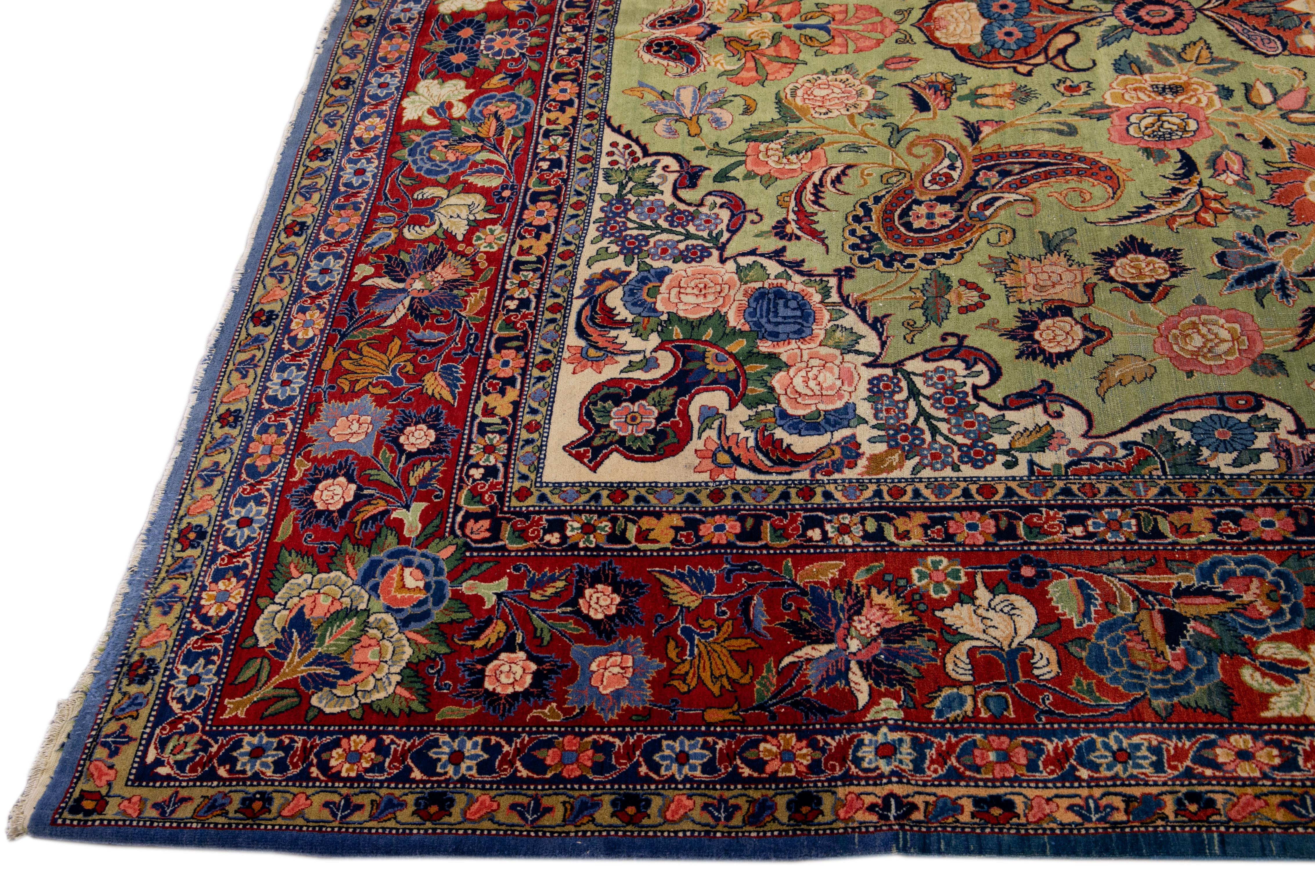 Antique Persian Kashan Handmade Allover Floral Green Wool Rug In Good Condition For Sale In Norwalk, CT