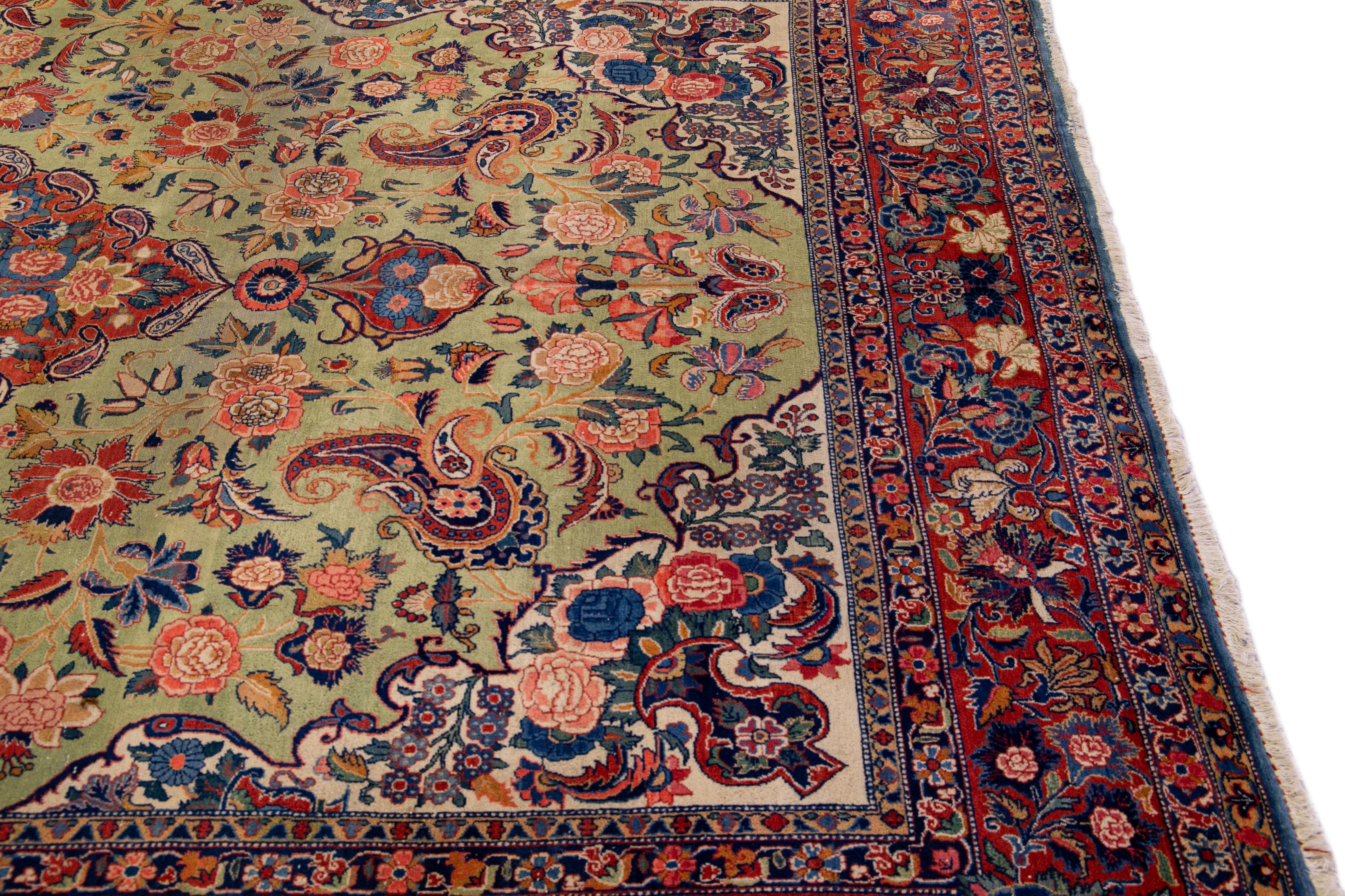 20th Century Antique Persian Kashan Handmade Allover Floral Green Wool Rug For Sale