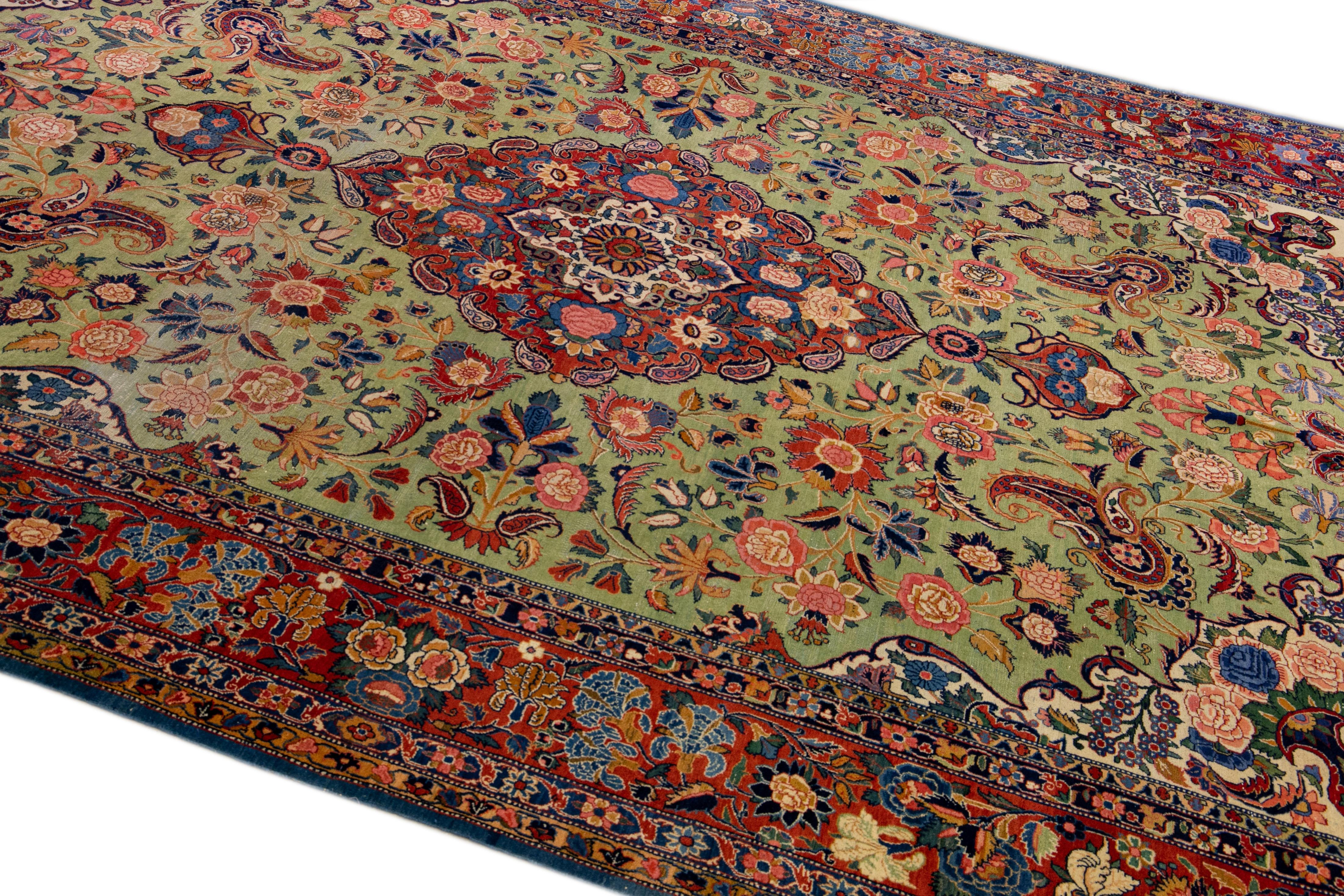 Antique Persian Kashan Handmade Allover Floral Green Wool Rug For Sale 1