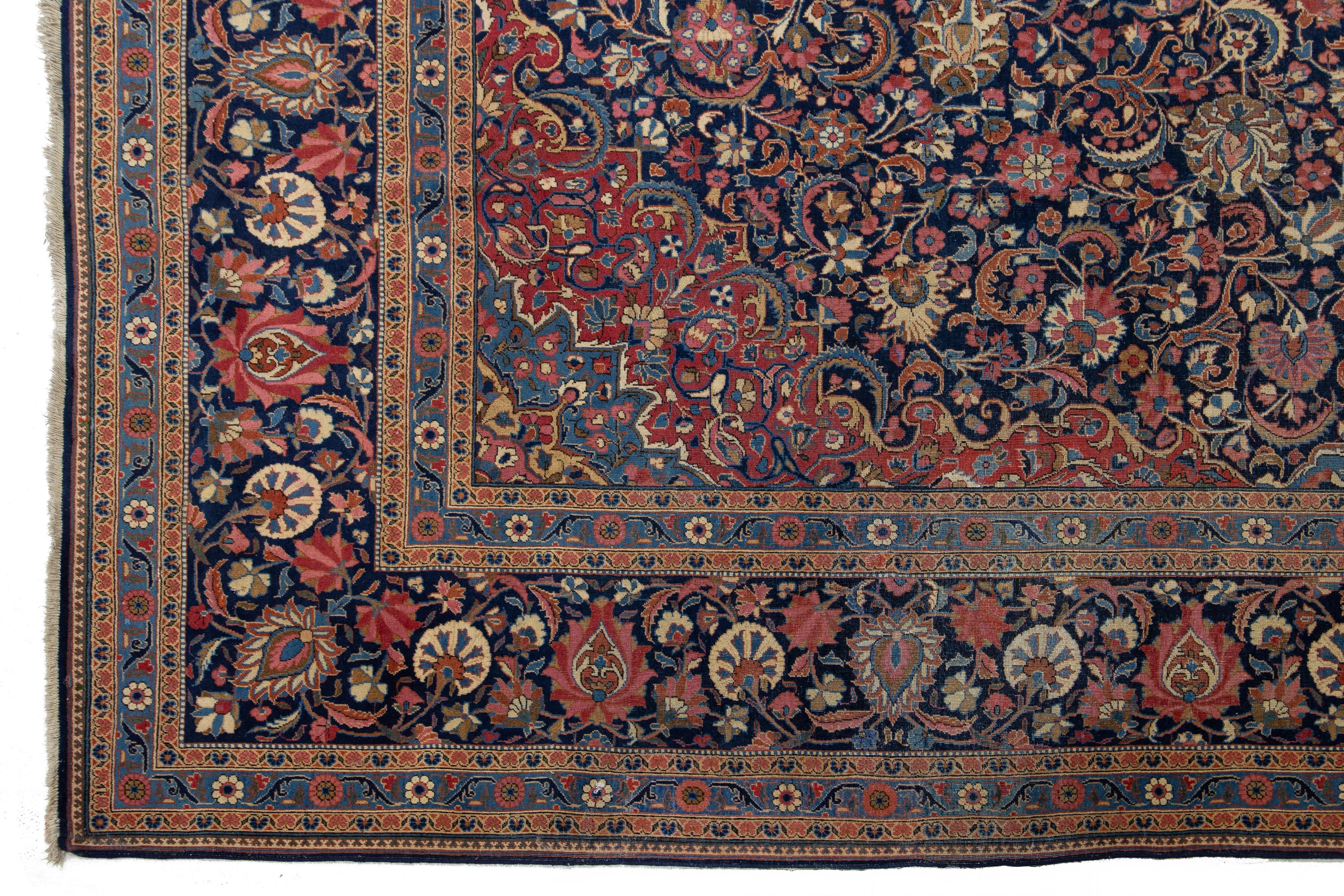 Laine Ancien tapis persan Kashan fait à la main en laine bleu avec médaillon en vente