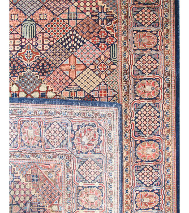 Persian Kashan Rug, 20th Century

This small format Kashan rug novelly reinterprets classical Persian garden design from the seventeenth century. It incorporates various abstracted flowers and vegetal forms within a quilt-like field pattern of