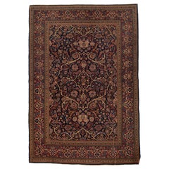 Tapis traditionnel persan de luxe ancien tissé à la main de couleur bleu marine et rouge de Kashan, vers 1900