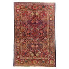 Tapis persan Kashan ancien avec motif de diamant Joshegan et couleurs de tons bijoutiers