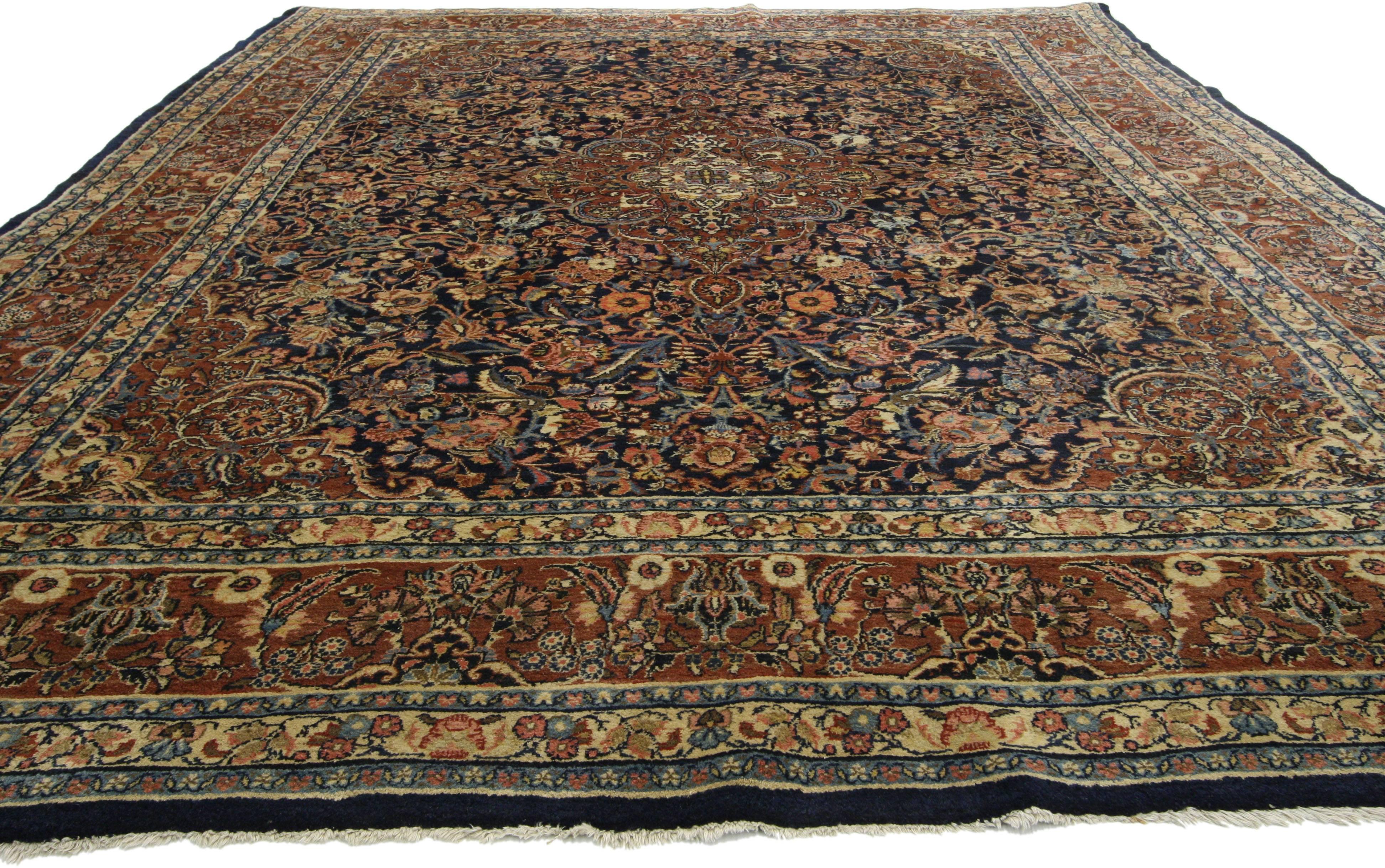 76597 Antique Persian Kashan Rug with Traditional Old World Style in Warm Colors 08'11 X 11'07. With its timeless elegance and regal charm, this hand knotted wool antique Persian Kashan rug features a sixteen point scalloped medallion anchored with