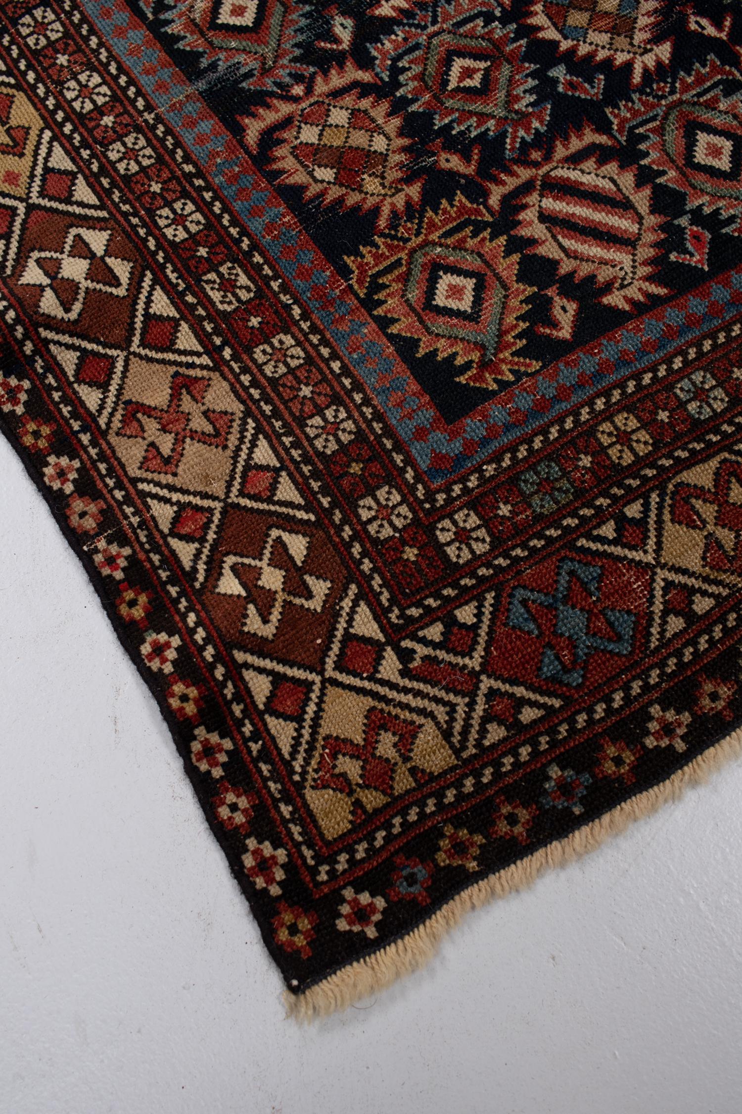 Early 20th Century Antique Persian Kazak Rug For Sale