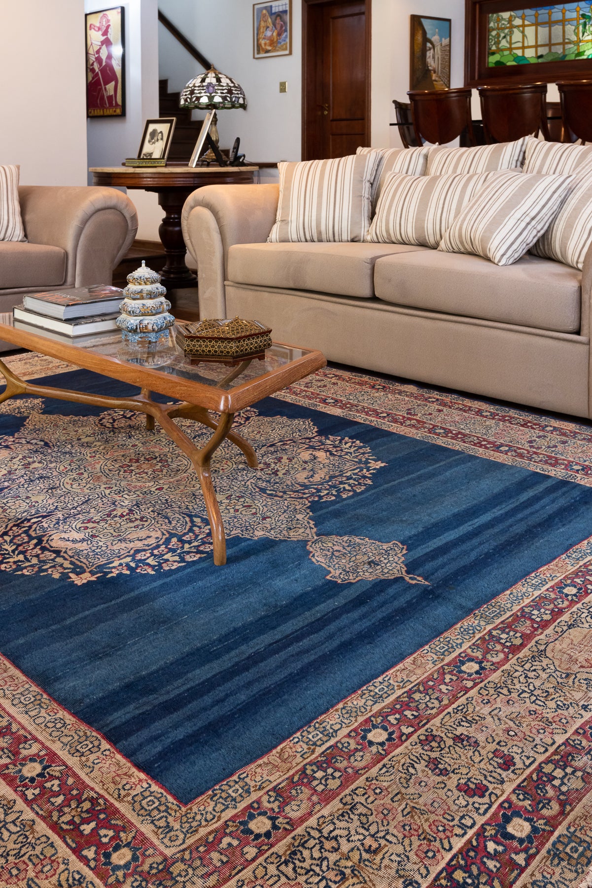 Exquisite Kerman Rug – A Journey Through Persian Elegance

Step into the world of Persian artistry with this exquisite Kerman rug, a true testament to timeless elegance. The medallion design, surrounded by delicate flowers and vines, contrasts