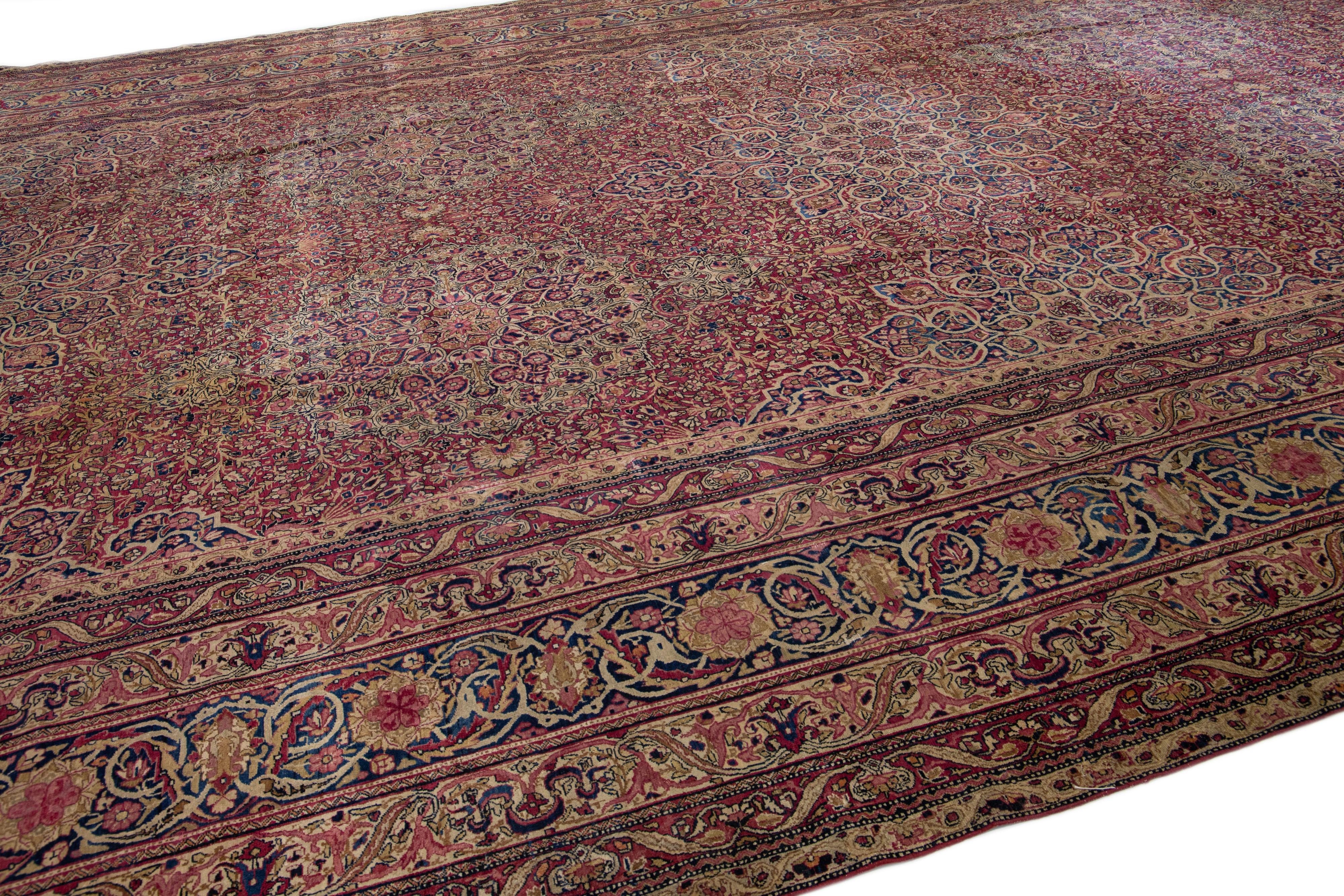 20th Century Antique Persian Kerman Handmade Multicolor Wool Rug with Rosette Design For Sale