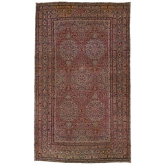 Antique Persian Kerman Handmade Multicolor Wool Rug with Rosette Design