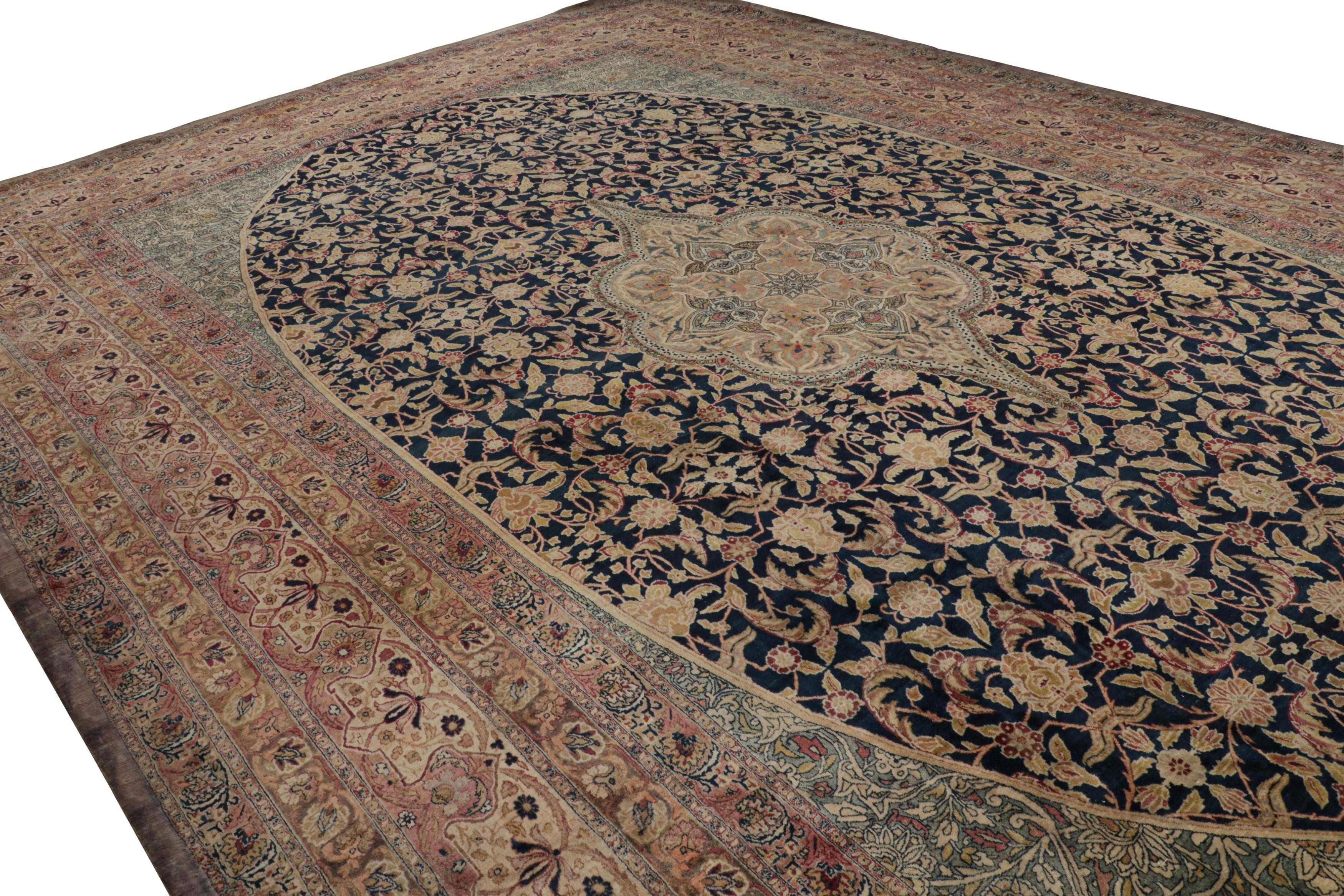 Handwoven in wool, this 15x23 antique Persian Kerman Lavar rug originating circa 1920-1930, is a masterpiece from one of the most sought-after weaving traditions in Persian city rugs. 

On the Design: 

Admirers of the craft will appreciate this