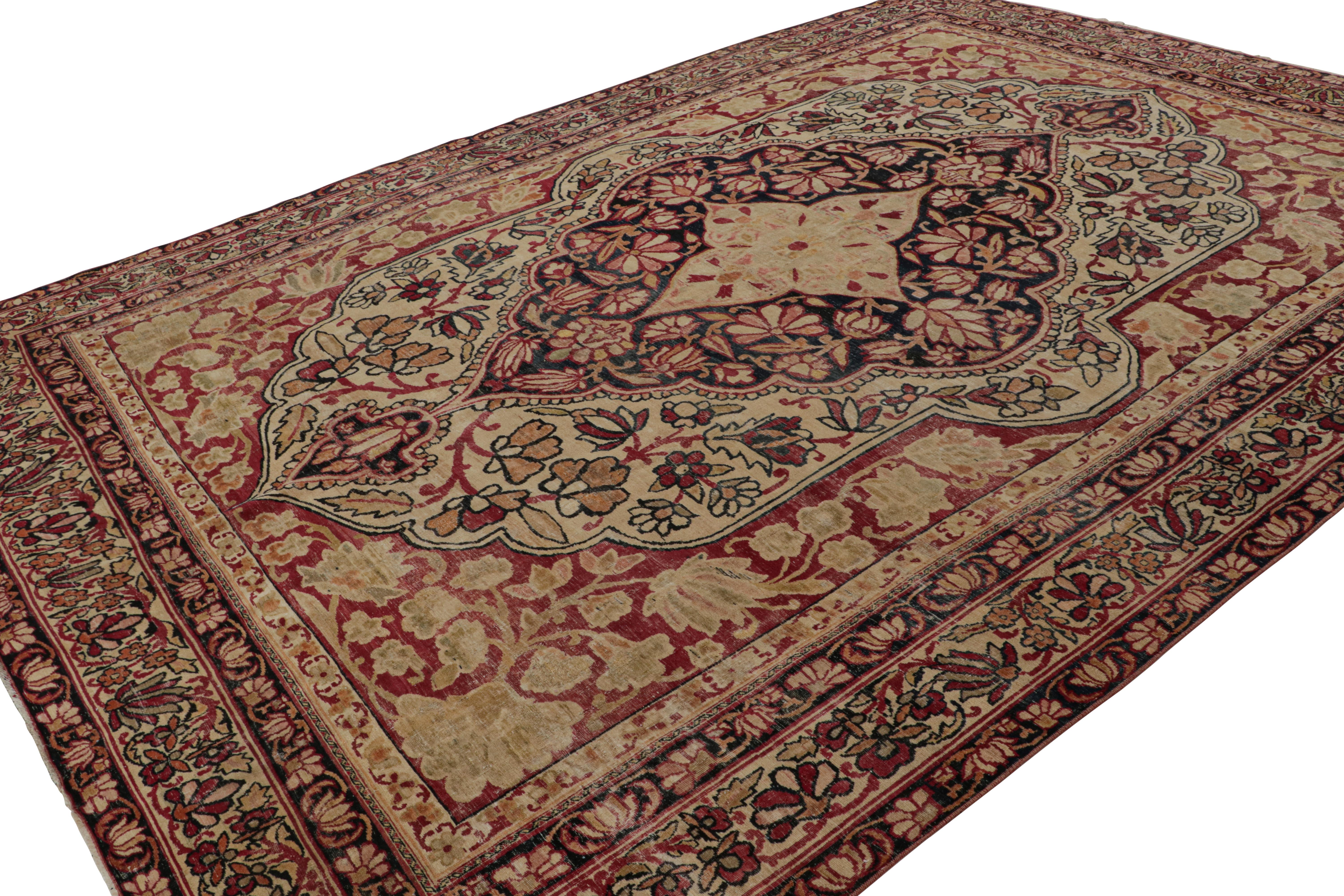 Handwoven in wool, this 15x23 antique Persian Kerman Lavar rug originating circa 1920-1930, is a masterpiece from one of the most sought-after weaving traditions in Persian city rugs. 

On the design: 

As regal as any Kerman Lavar rug, this