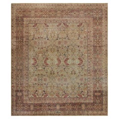 Ancien tapis persan Kerman Lavar à motifs floraux