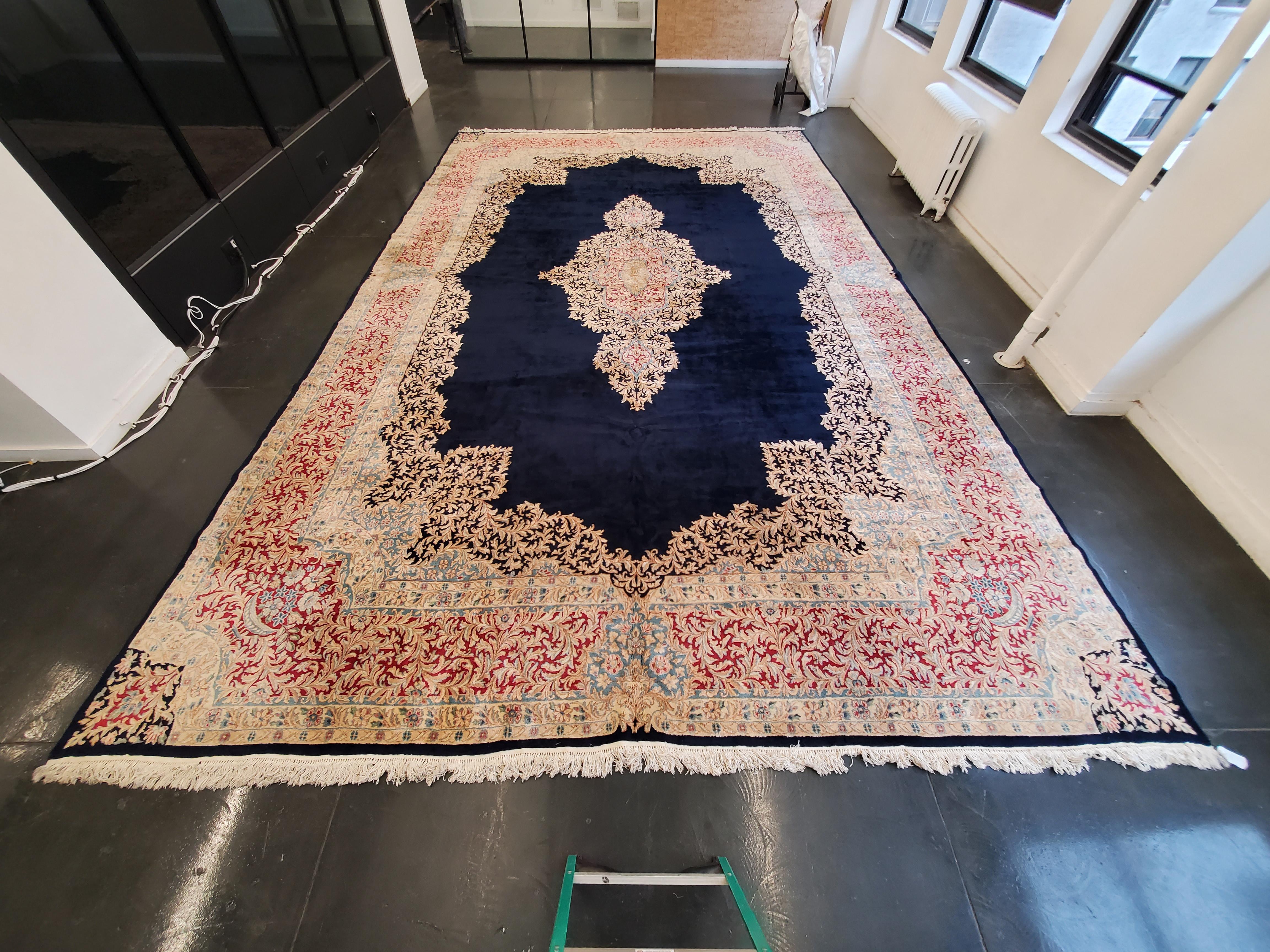 This early 20th-century Persian Kerman floral carpet, dating from circa 1920, epitomizes the exceptional quality and artistry of Persian rug weaving during a period of significant transition and refinement. Kerman, a renowned carpet-producing region