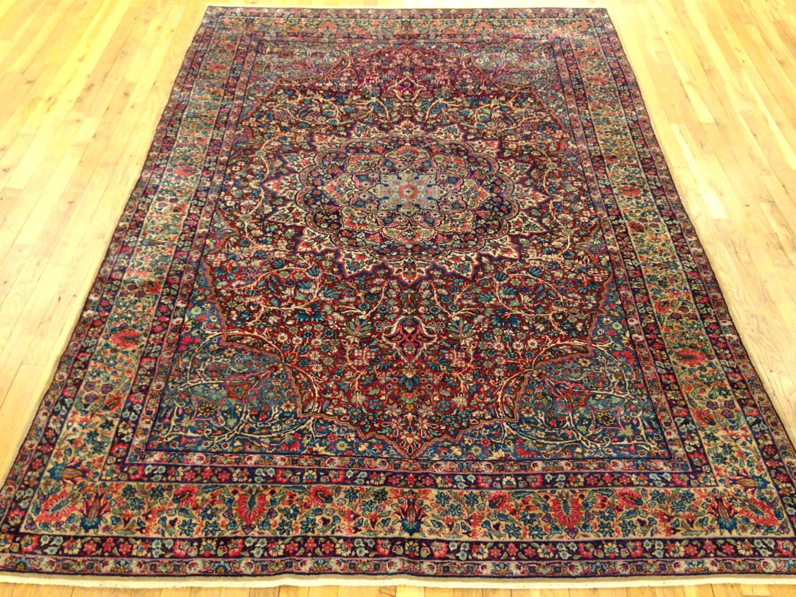 Hand-Knotted Antique Persian Kerman Oriental Rug, Room Size, with a Central Medallion For Sale