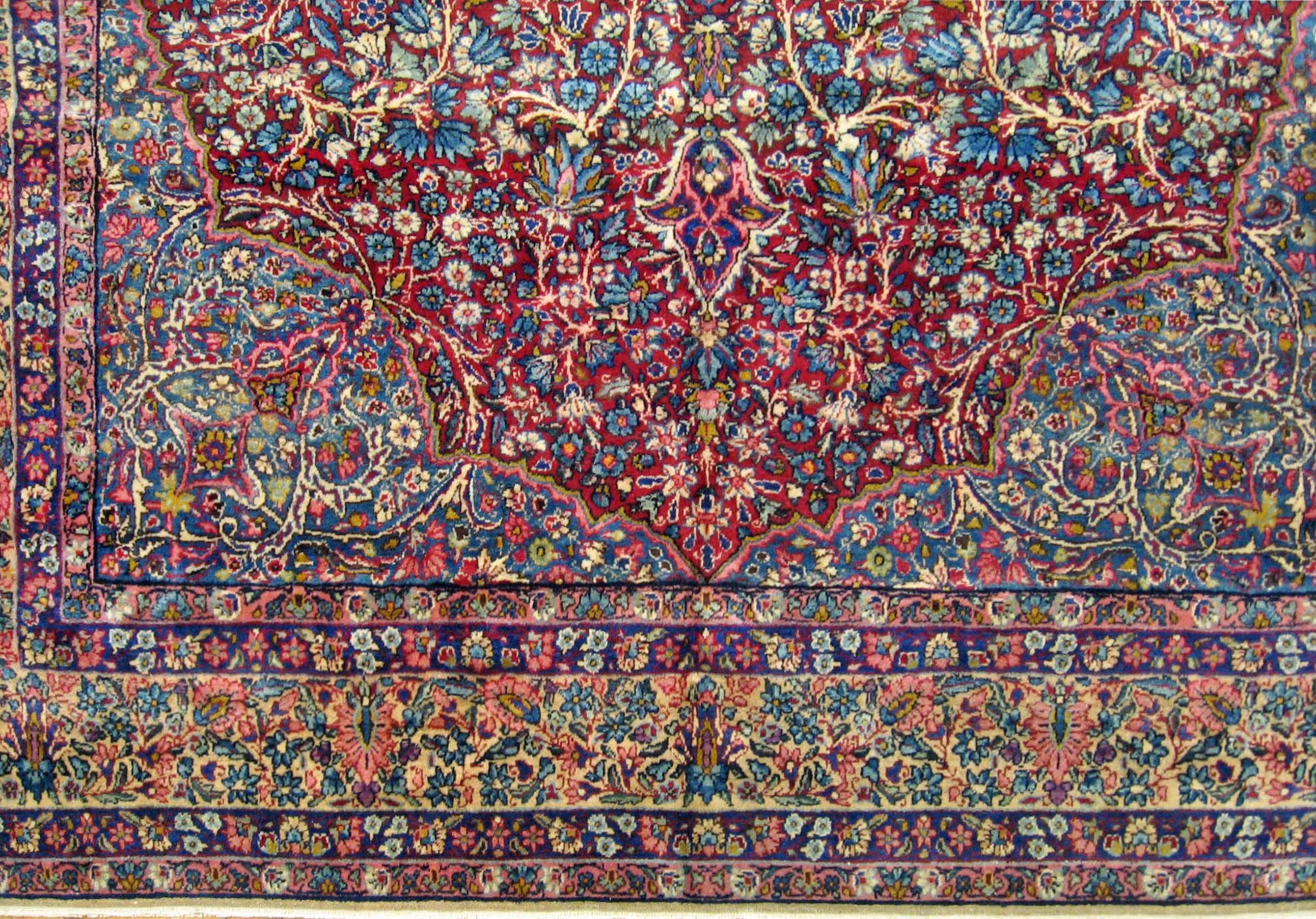 Early 20th Century Antique Persian Kerman Oriental Rug, Room Size, with a Central Medallion For Sale