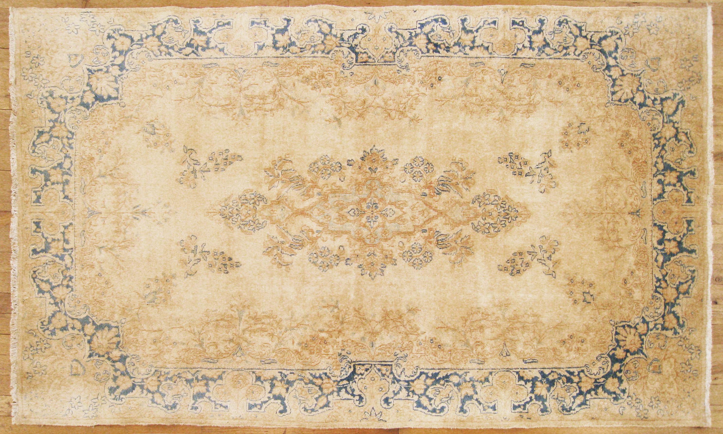 Wool Antique Persian Kerman Oriental Rug, Room Size, with Floral Elements For Sale