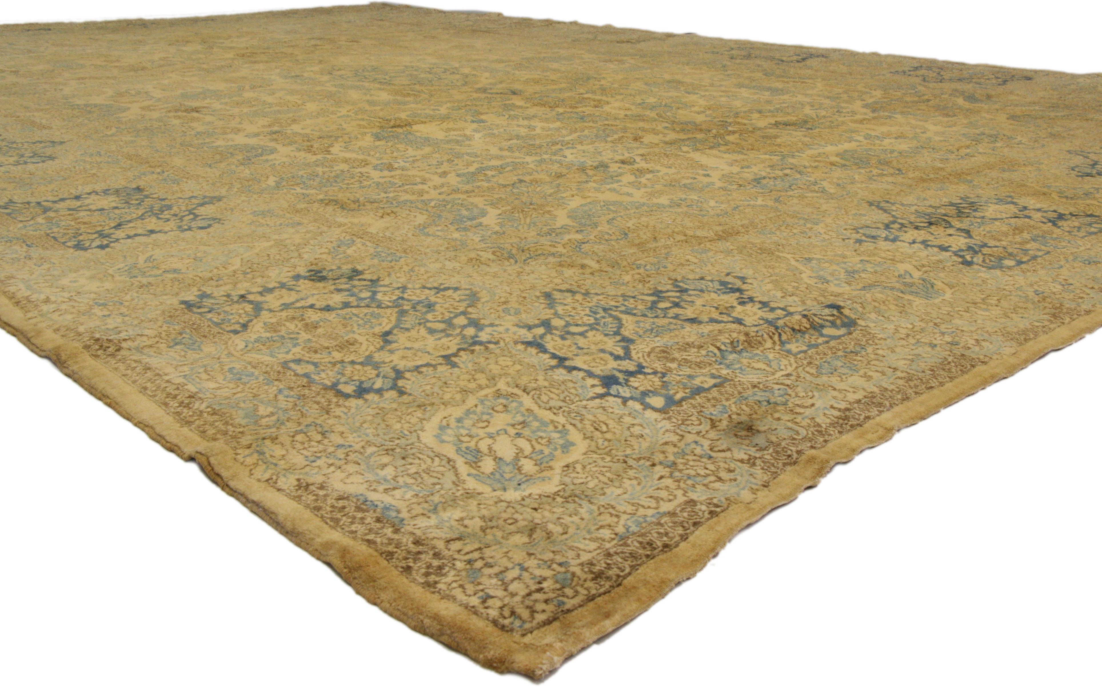 73654 Antique Persian Kerman Palace rug with French Victorian style. Opulence and grace meld together in this hand knotted wool antique Persian Kerman palace rug as it beautifully embodies French Victorian style. The warm golden hued field features