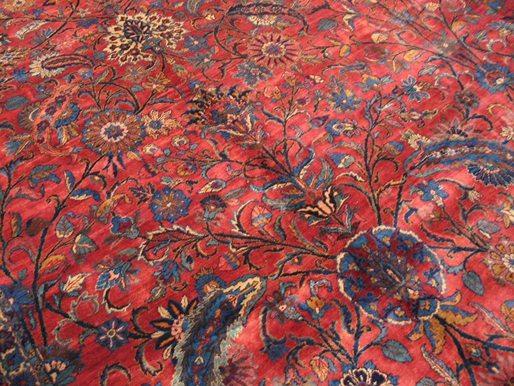 Early 20th Century S.E. Persian Kirman Carpet ( 15' x 30' - 457 x 914 )
The color scheme of this giant rug is rich and complex, with a wine red field and royal blue major border. Allover designs were a Kerman specialty and no other area can match
