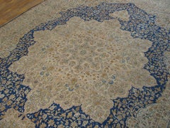 Delicate Floral Pattern and Ivory Background Color Antique Persian Kerman Rug