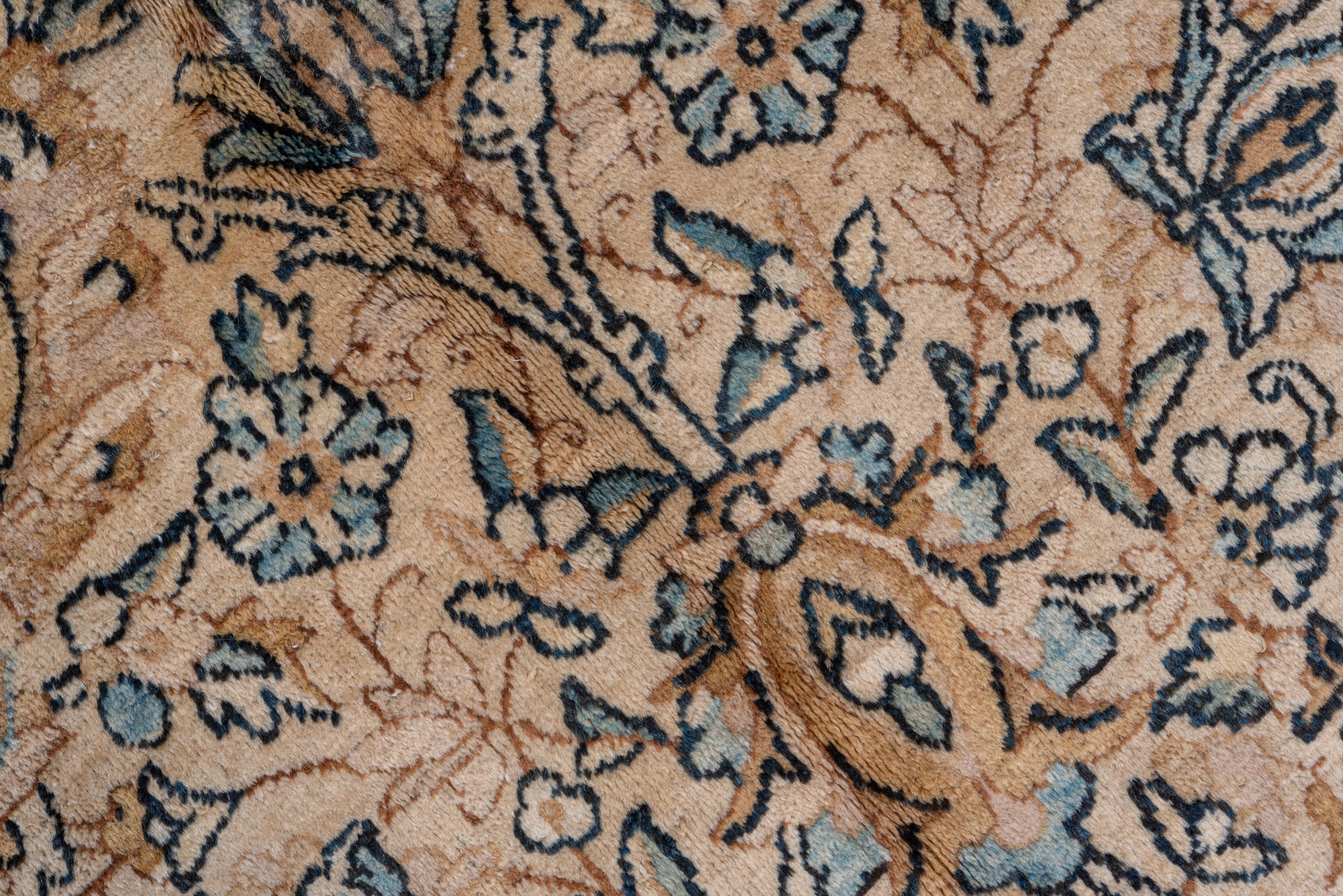 Wool Antique Persian Kerman Rug, Beige Palette, Blue Accents, circa 1920s For Sale
