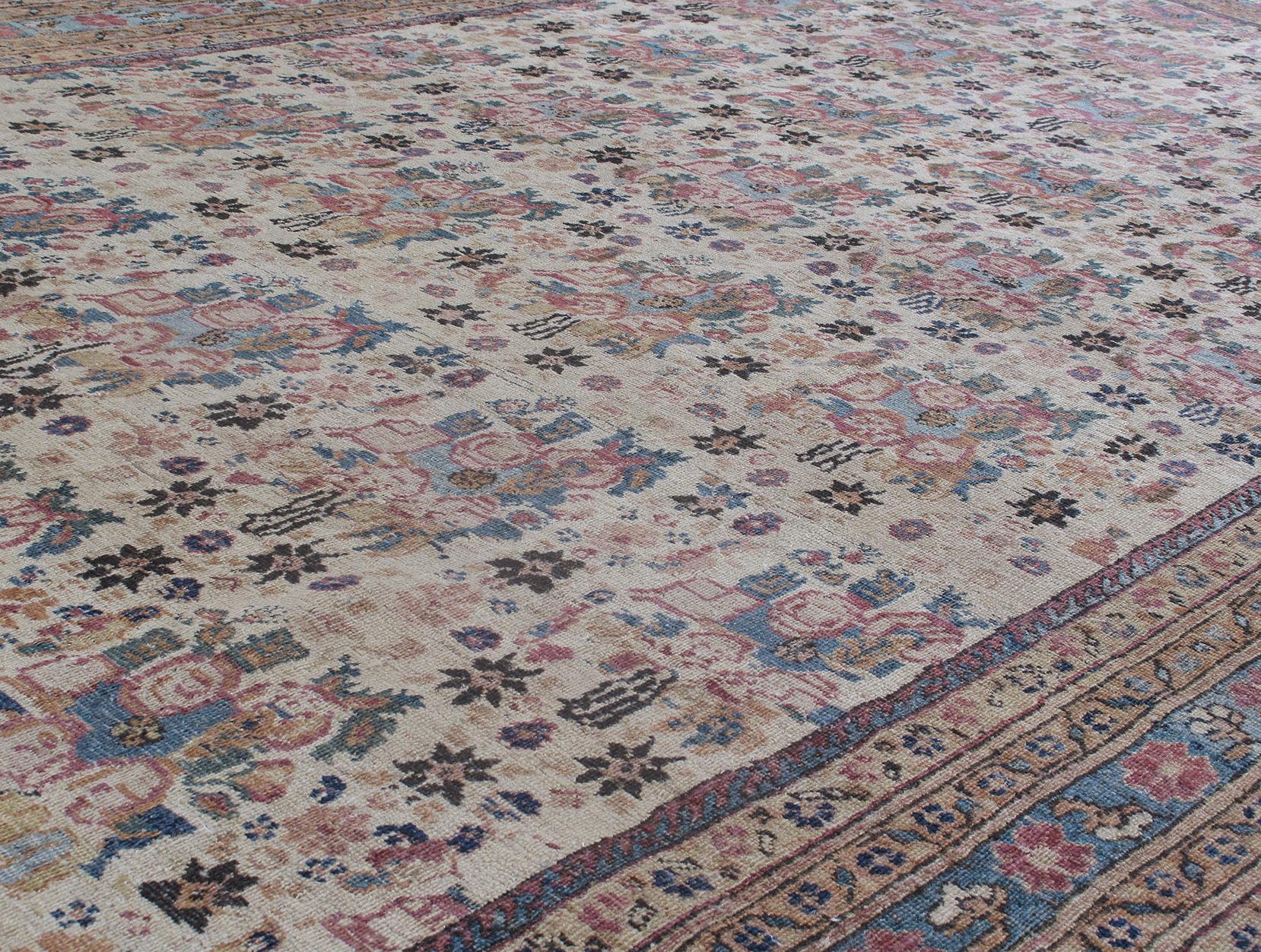 This antique Kerman rug is skillfully sourced by N A S I R I through extensive travel, passion, and research. Kerman rugs are named after a major rug weaving village in central south-eastern Iran. The village was known for producing extremely fine