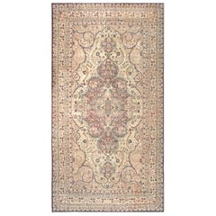 Tapis persan ancien de Kerman de 11' 2"" x 20' 10"".