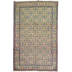 Antique Persian Kerman Rug