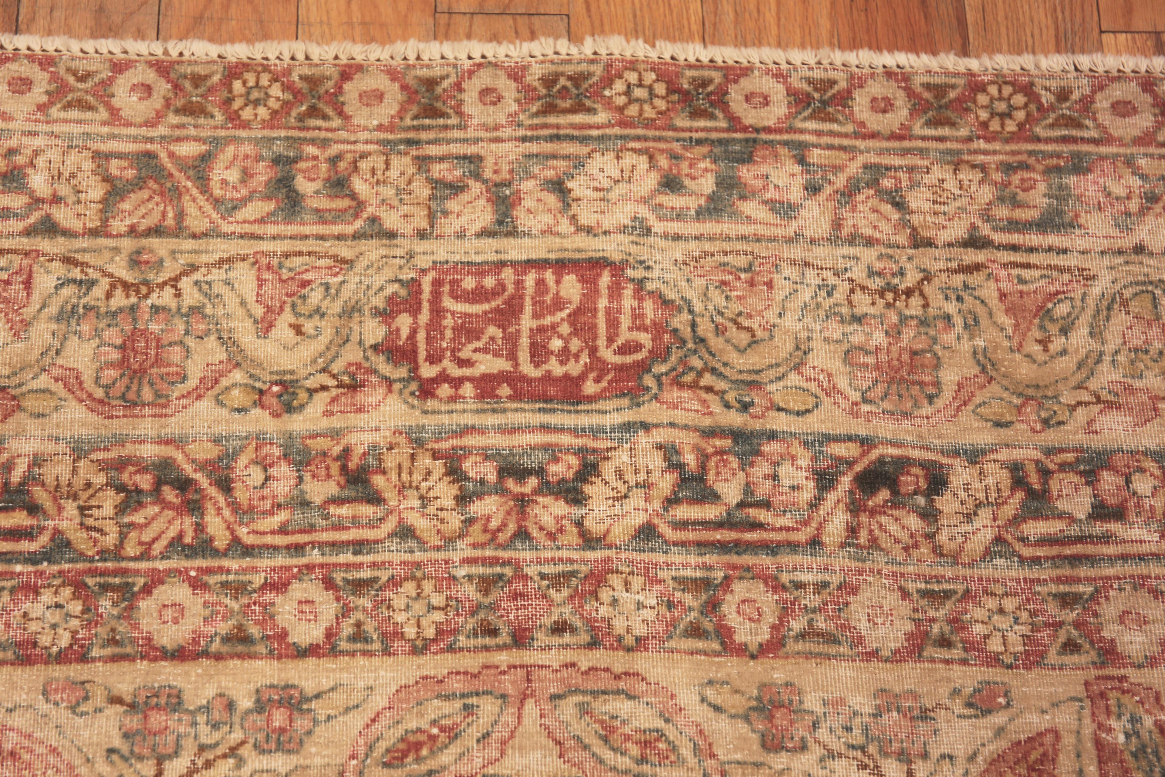 Kirman Antique Persian Kerman Rug Signed “Taftanchian”. 6 ft 8 in x 8 ft 8 in  For Sale
